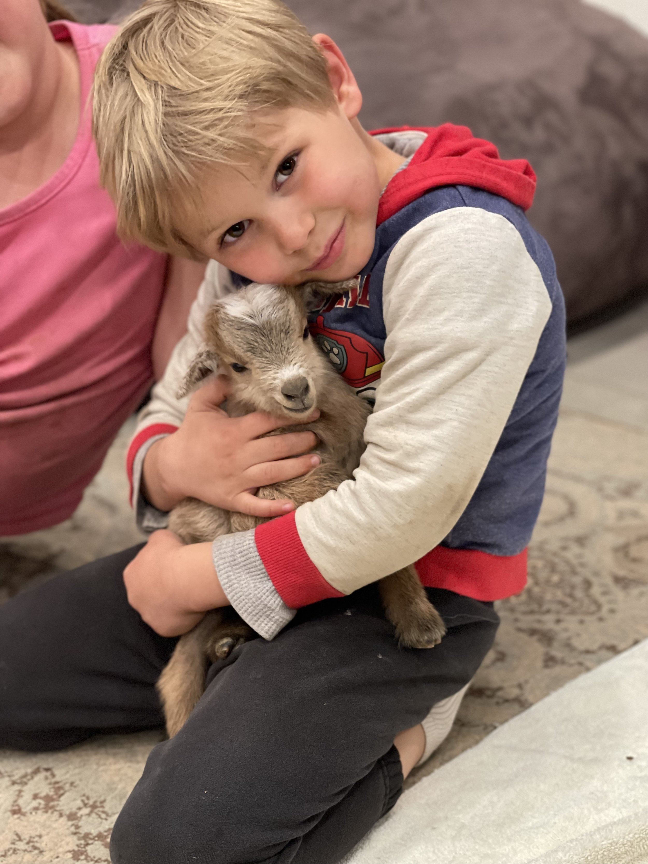 ethan and baby goat.jpg