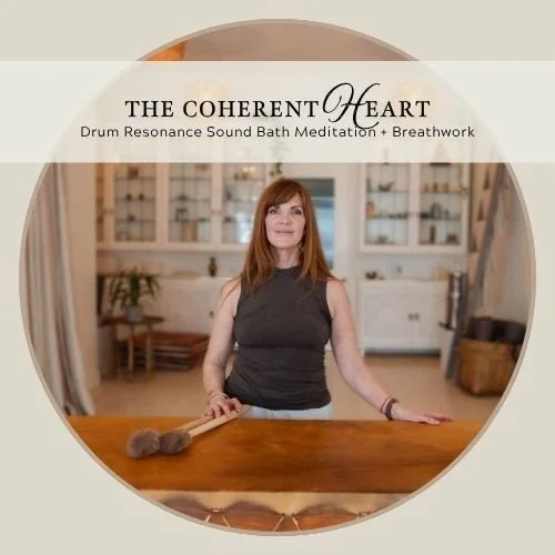 Angela Prider standing with the horse unity drum from the Coherent Heart soundbath