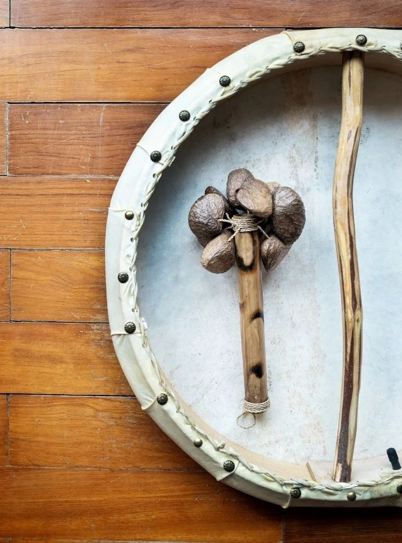 drum and rattle sitting on wood floor, angela prider, shamanism