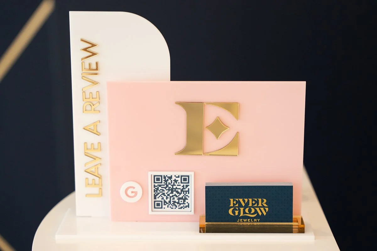 Everglow Jewelry store interior with business cards and signage