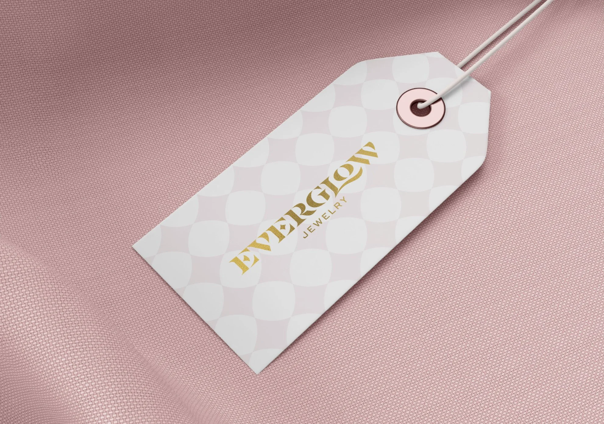 luxury hang tag packaging concept with gold foil logo and diamond pattern repeat background in pink