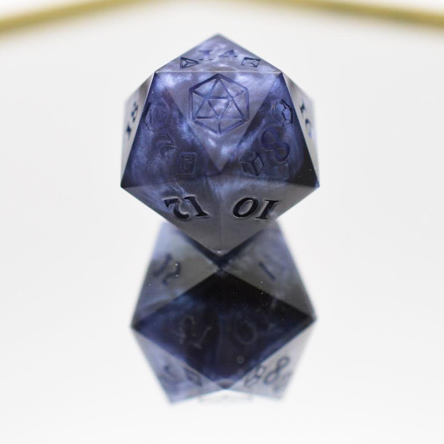 Warforged. Singles. Uninked. 

Silver purple clouds form in a black base. 
 
#dice #handmade #diceset #resin #dicelove #handmadedice #handmadewithlove #pathfinder #diceporn #rpgdice #dnd #dungeonsanddragons #ttrpg #d20  #alumilite #sevenfatesdice