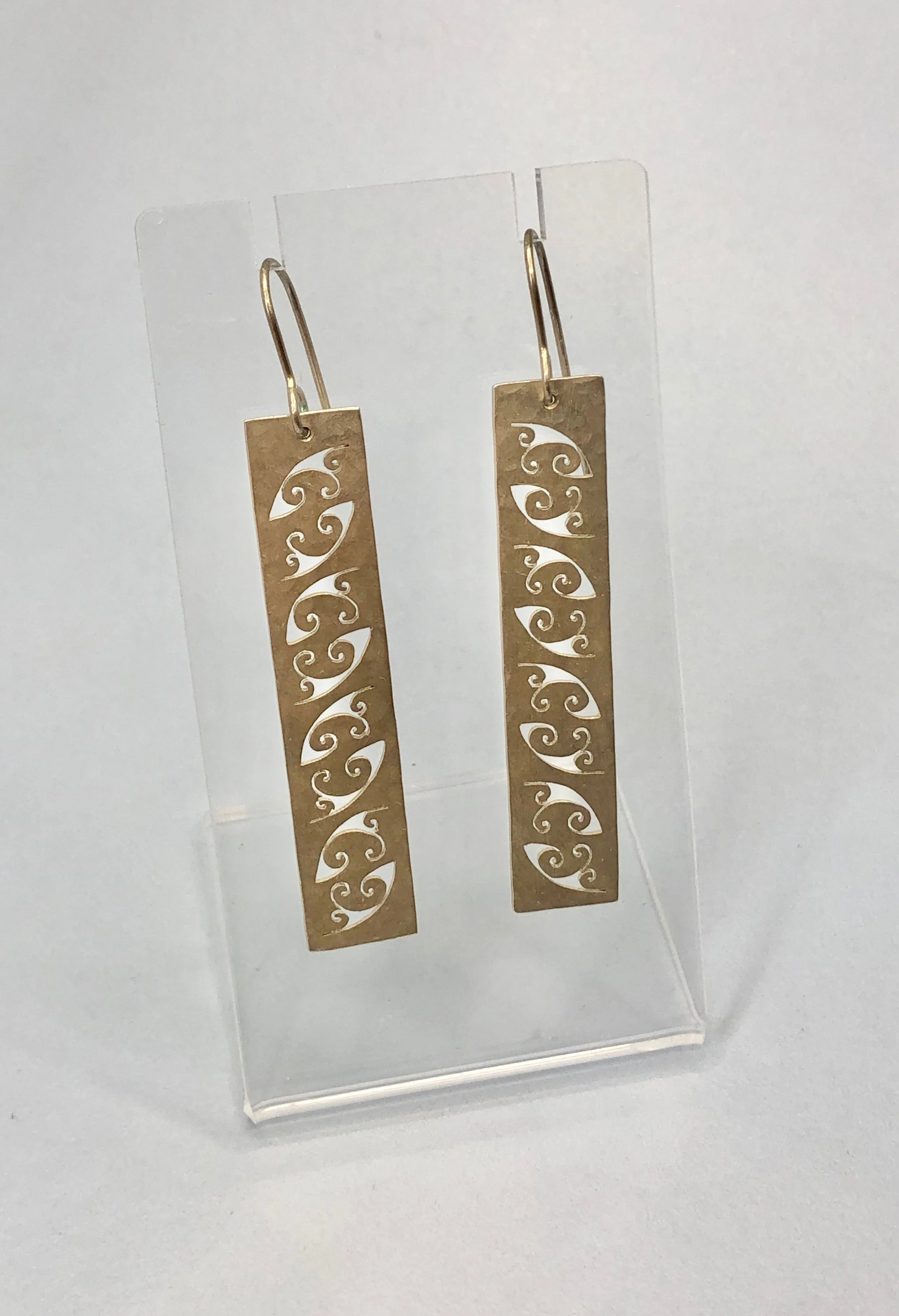 Sterling silver earrings shown hanging.