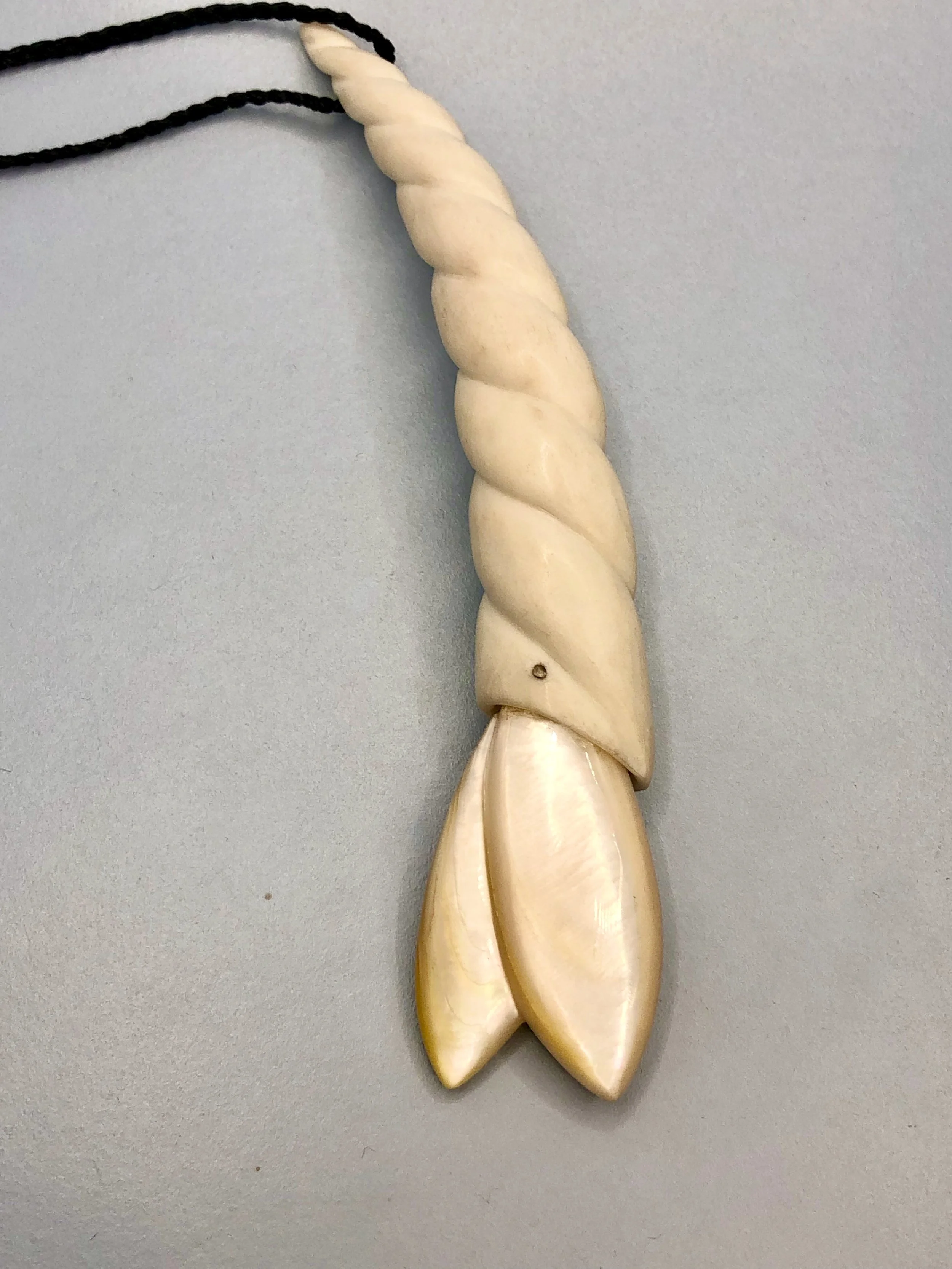 Mother of pearl shell flower bud and spiral carved antler tine pendant
