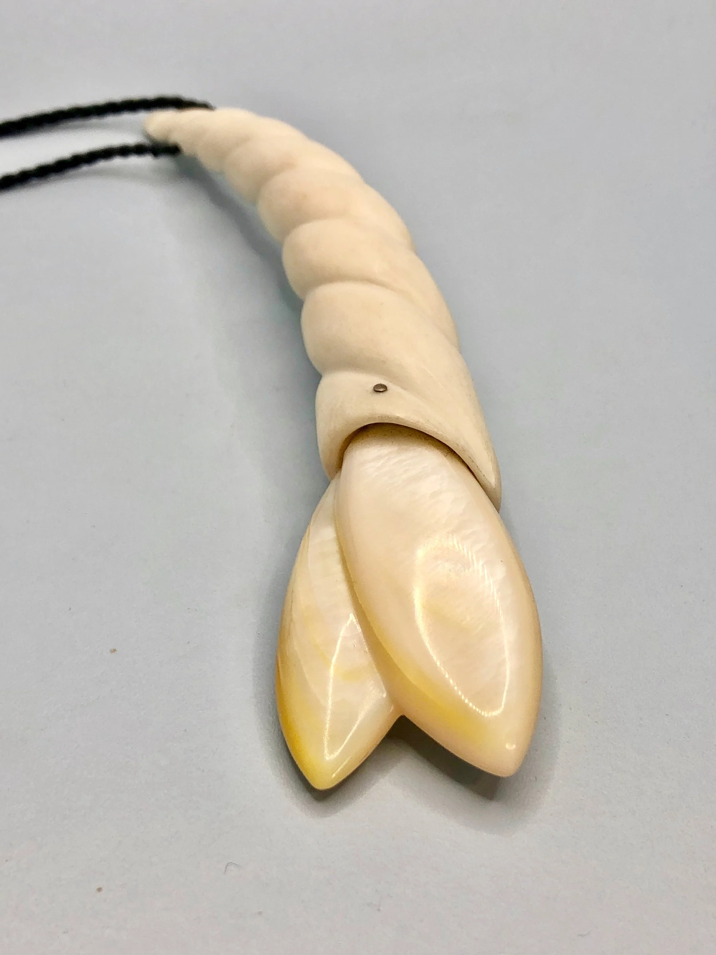 Mother of pearl and antler pendant