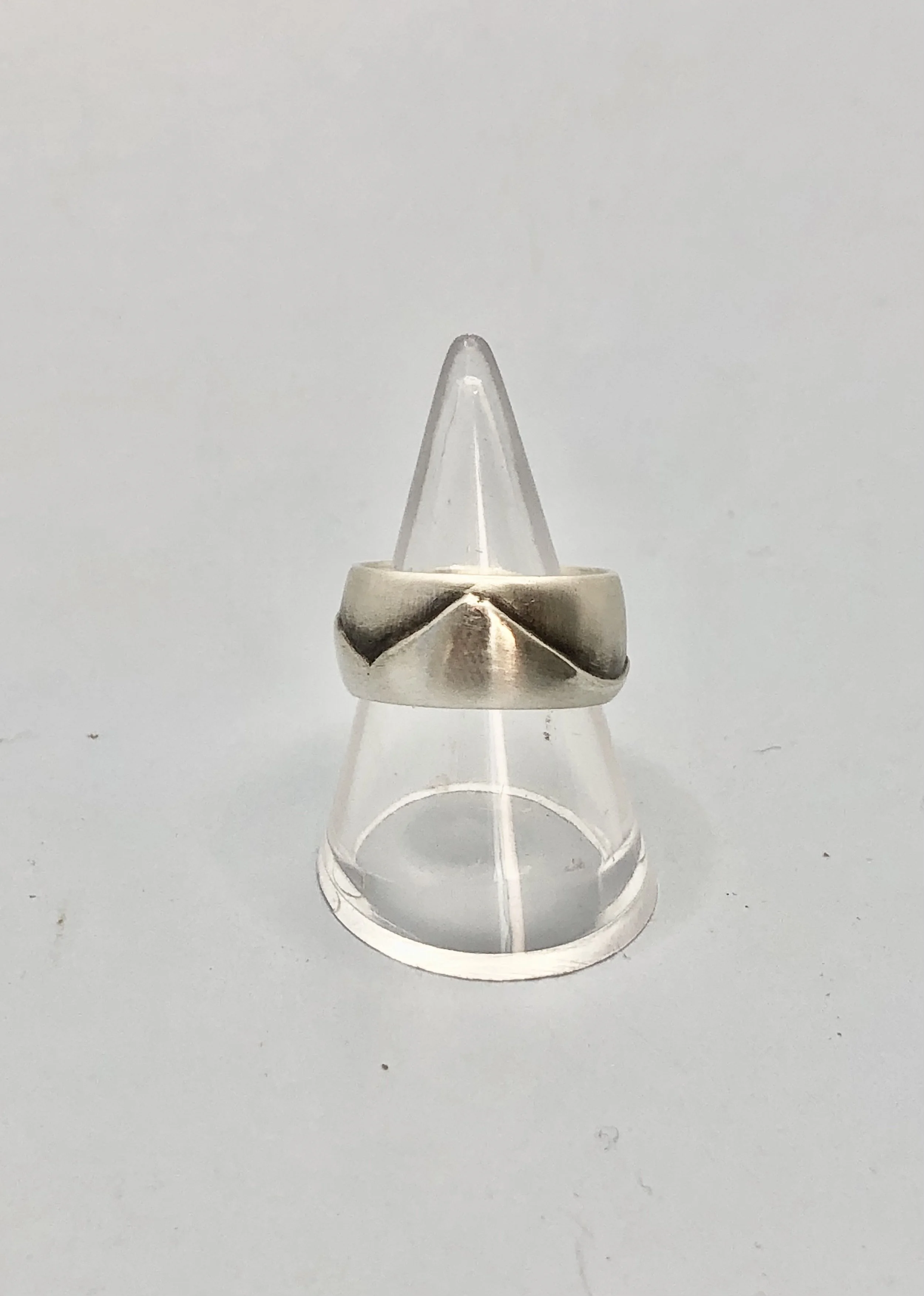Taranaki Ranges sterling silver ring showing Taranaki Maunga, Pouakai, Pukeiti and Kaitake mountain profiles. Rachel Lambert Jewellery