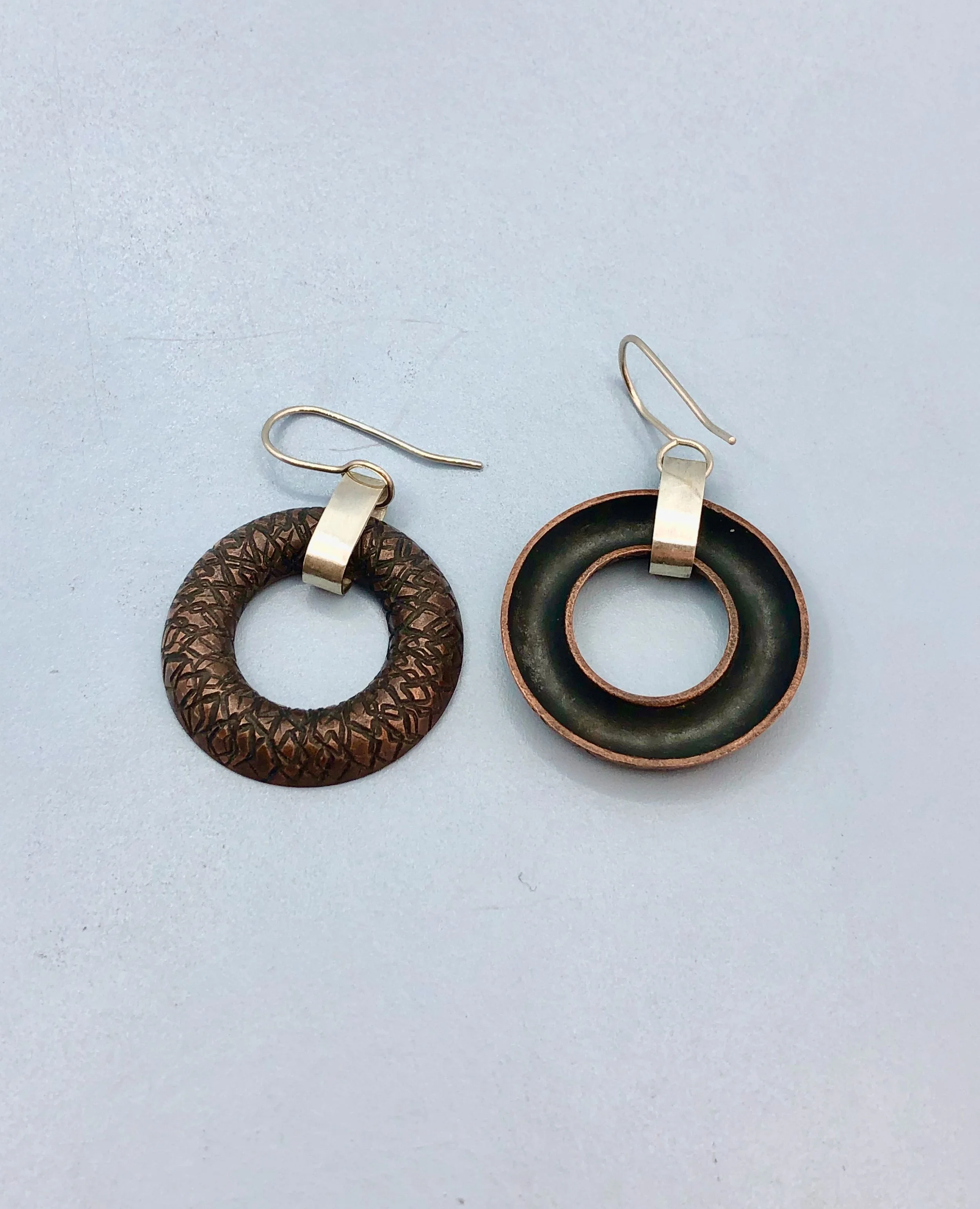 Copper and sterling silver earrings showing front and reverse sides