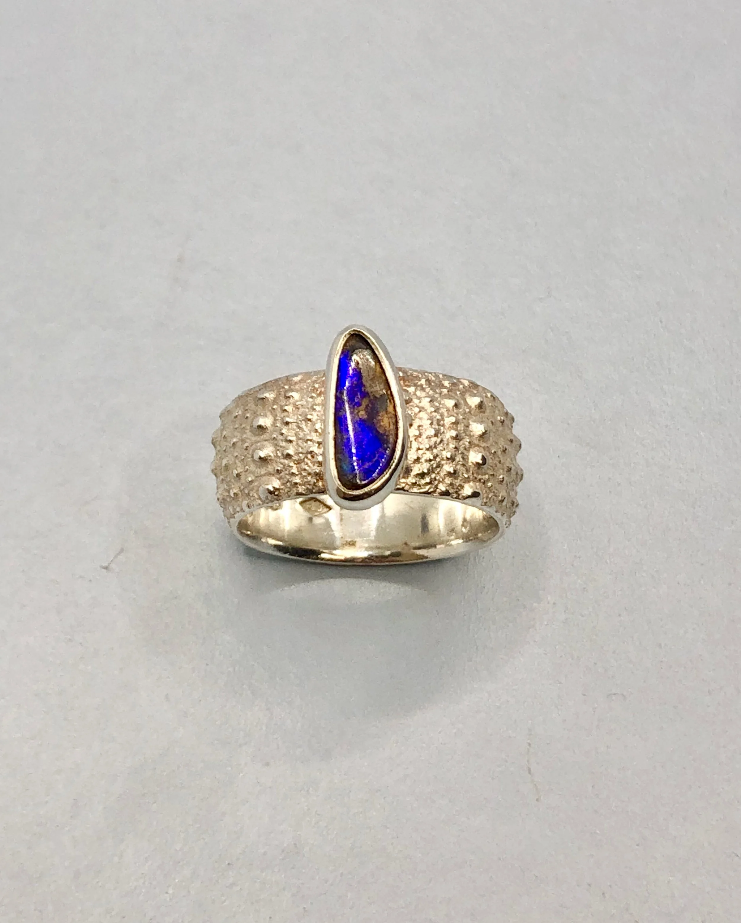 Top down view of opal and silver ring