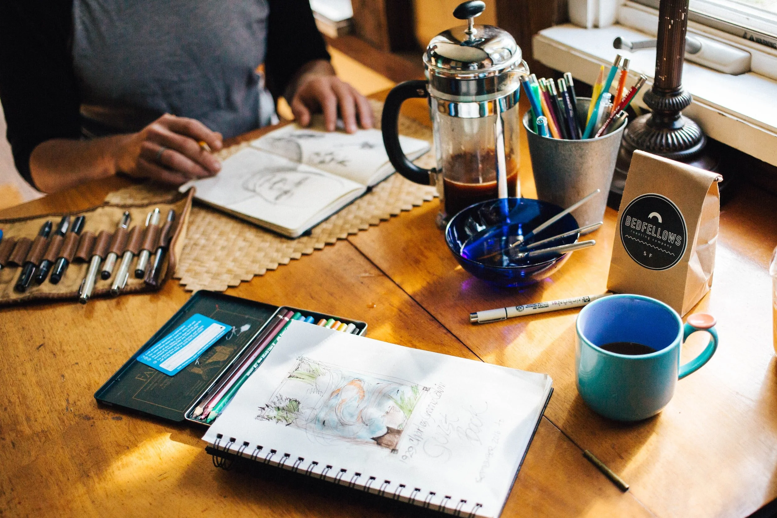 Businesses can partner with local artists to create unique merch