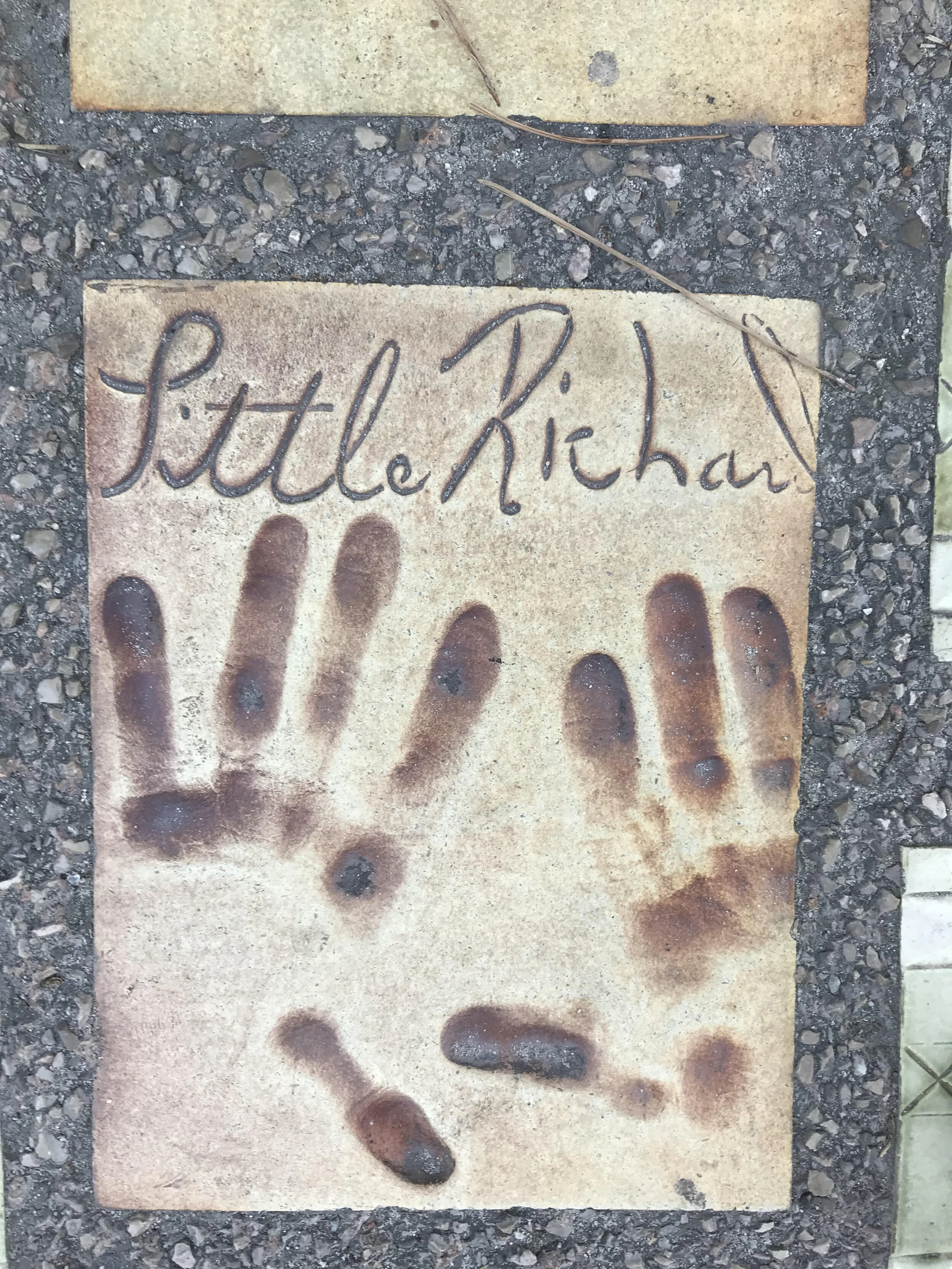 One of a large number of these imprints on the promenade in Juan les Pins, France