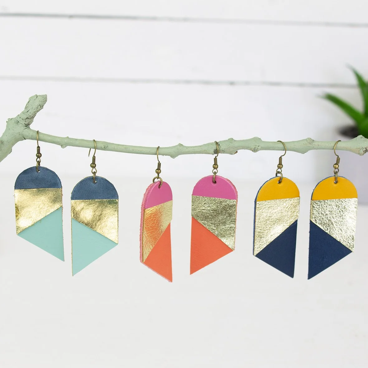 modernist earrings x6 on branch.jpg