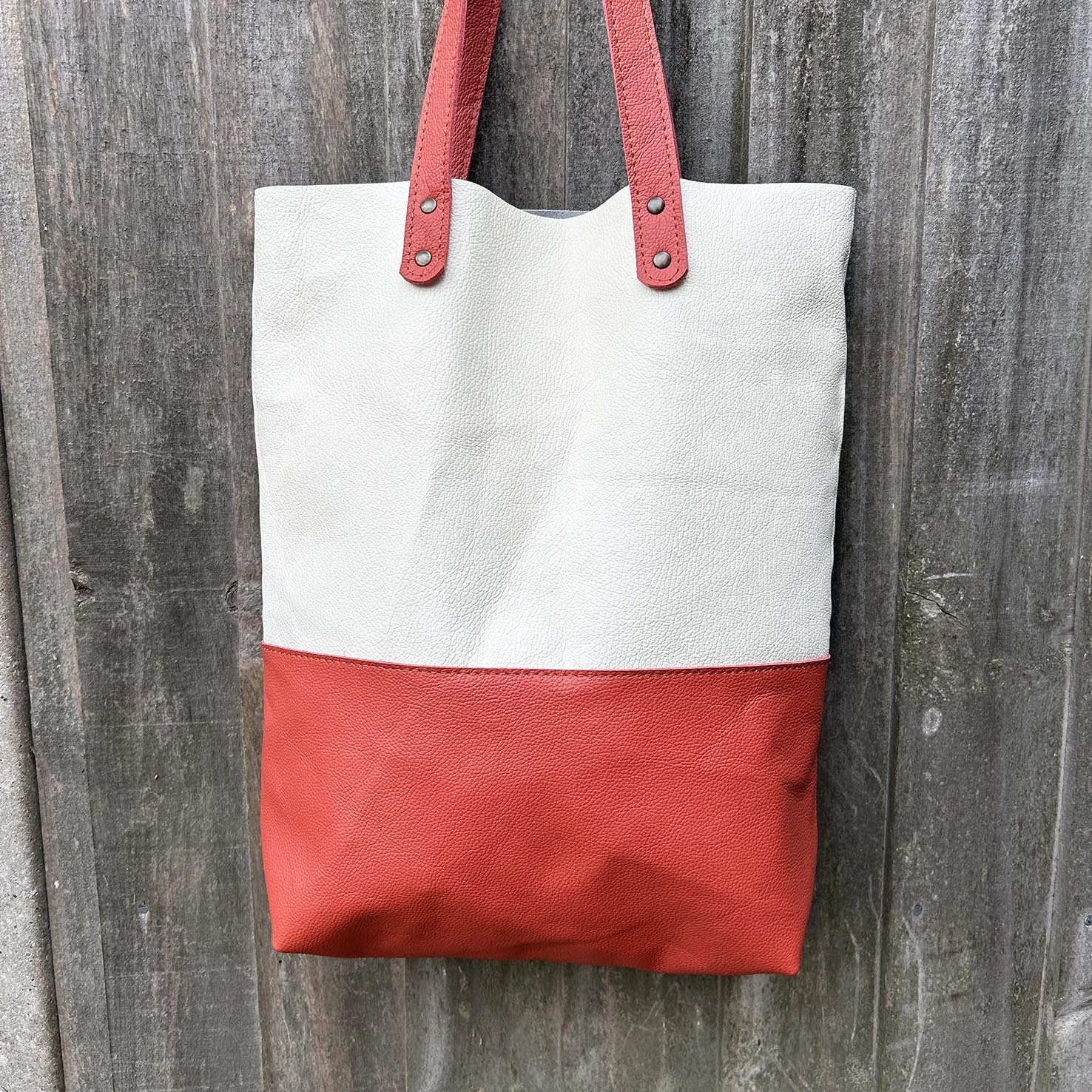 Coral bag front square no charm.jpg