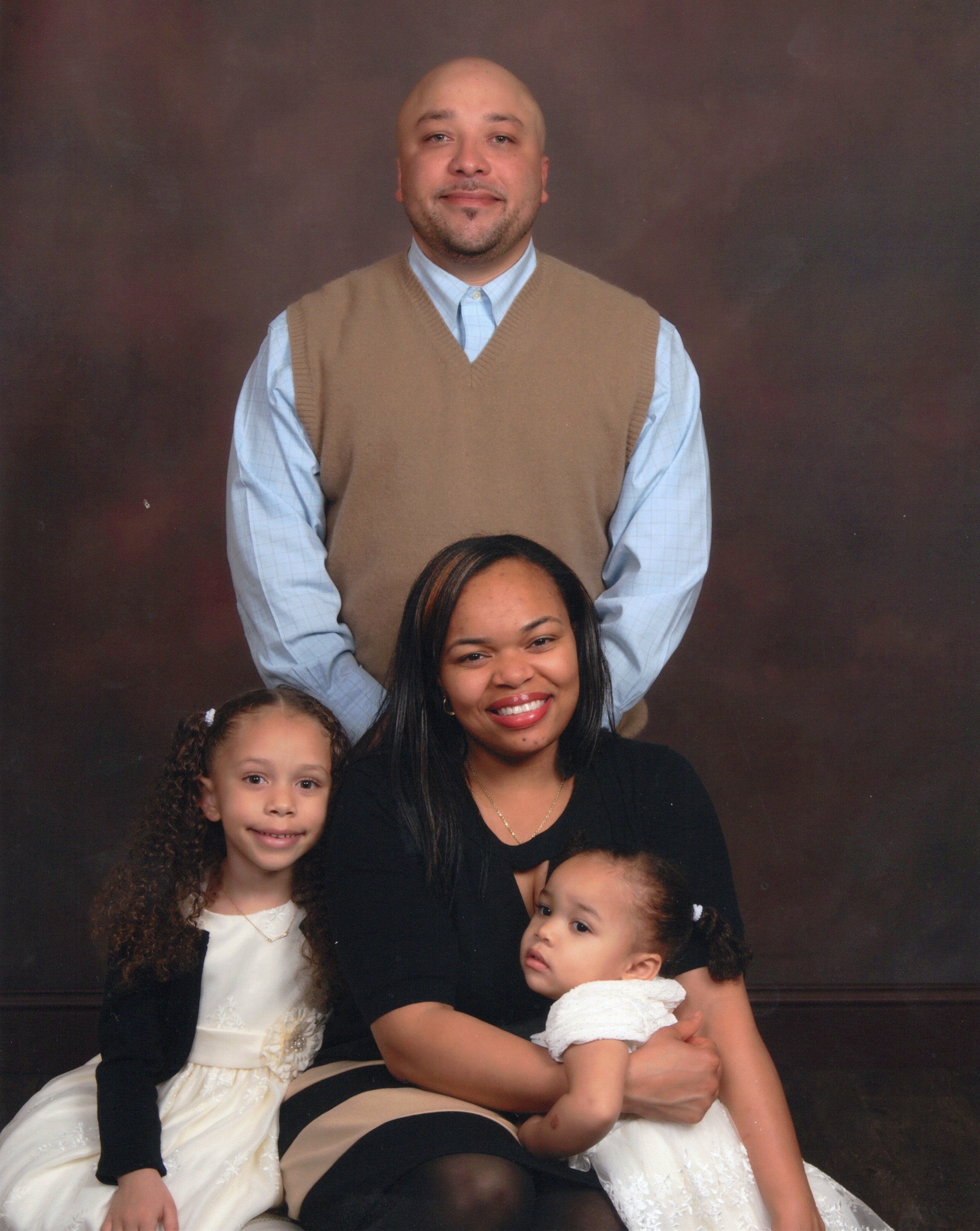 Mike with wife and children.jpg