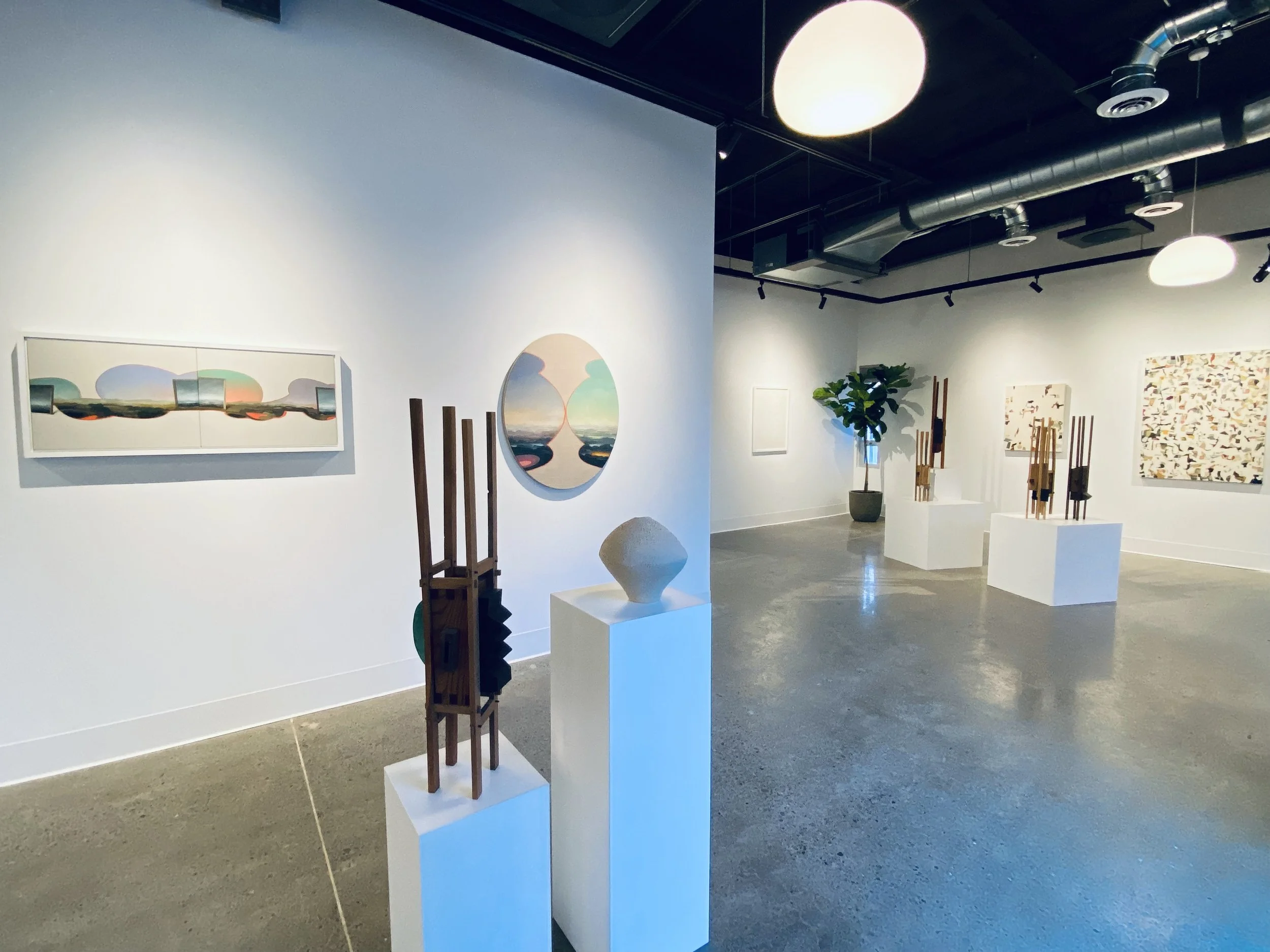 Partial installation view at the gallery at Trade Design Build in February, 2026. Work by Roberto Bertoia, Ariel Bullion Ecklund, John McLaughlin and Jeff Quinn