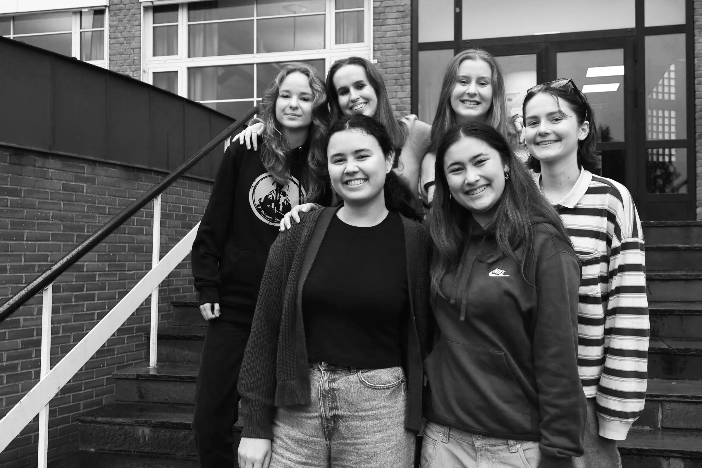 A group of girls smiling