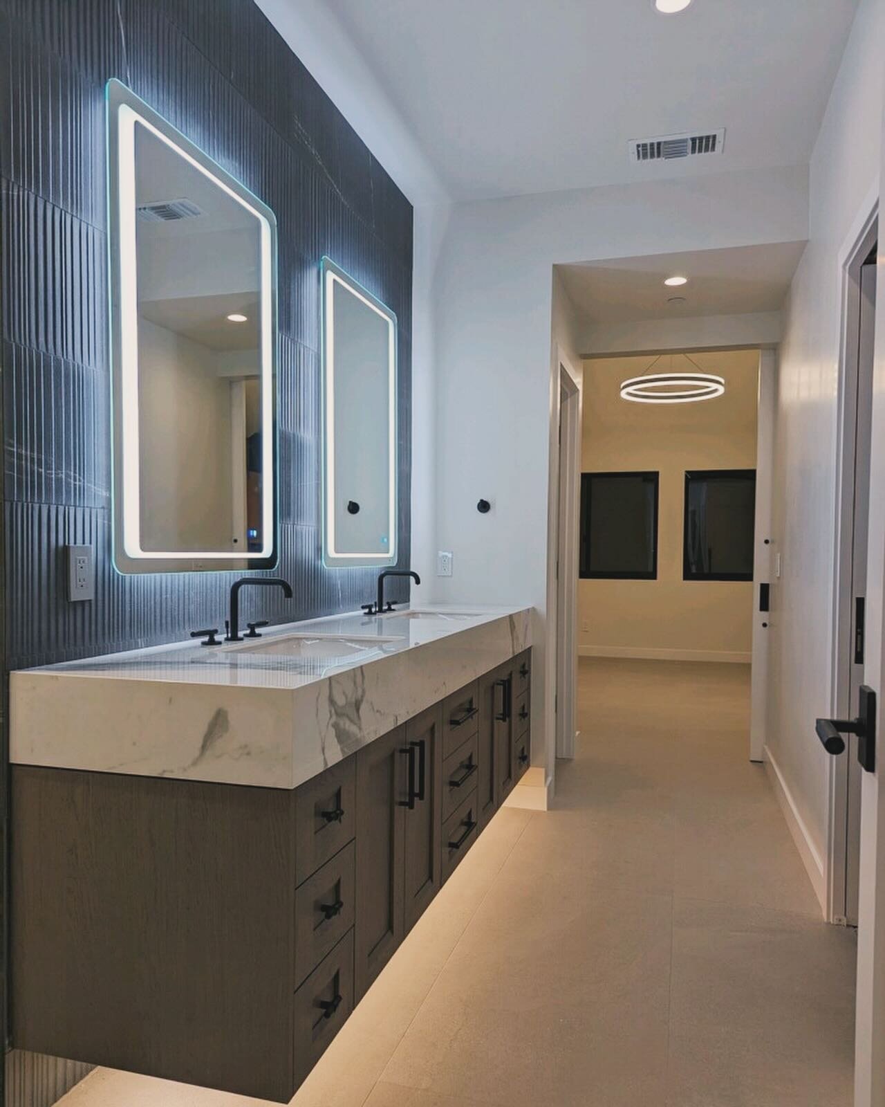 Elegant and sleek for this new modern master bath❣️#interiors #newbathroom #marble #texture #custom #renovation #modern #cali #coastal #design