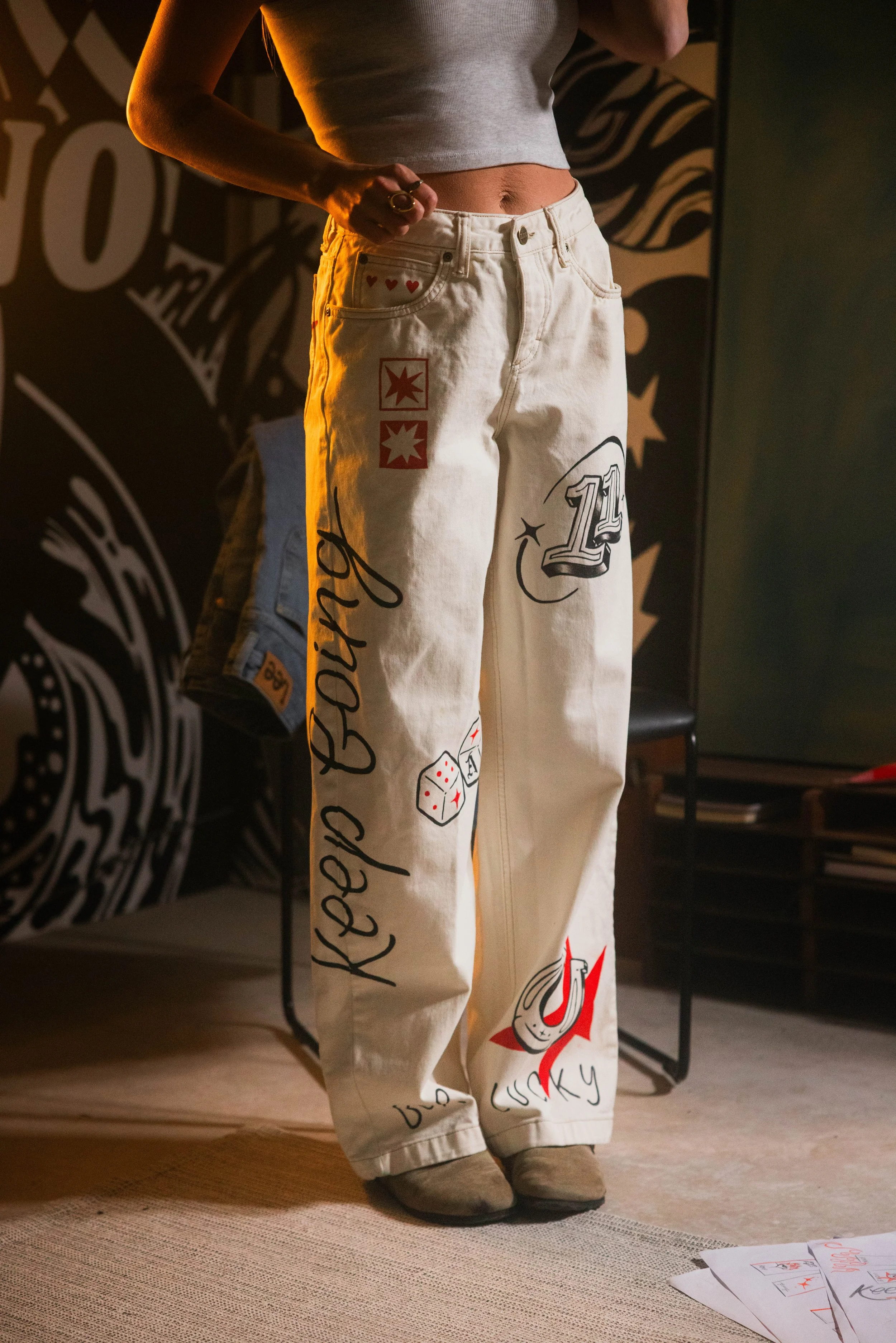 Lee Jeans x Alana McDowell customisation collaboration - hand illustrated jeans. 