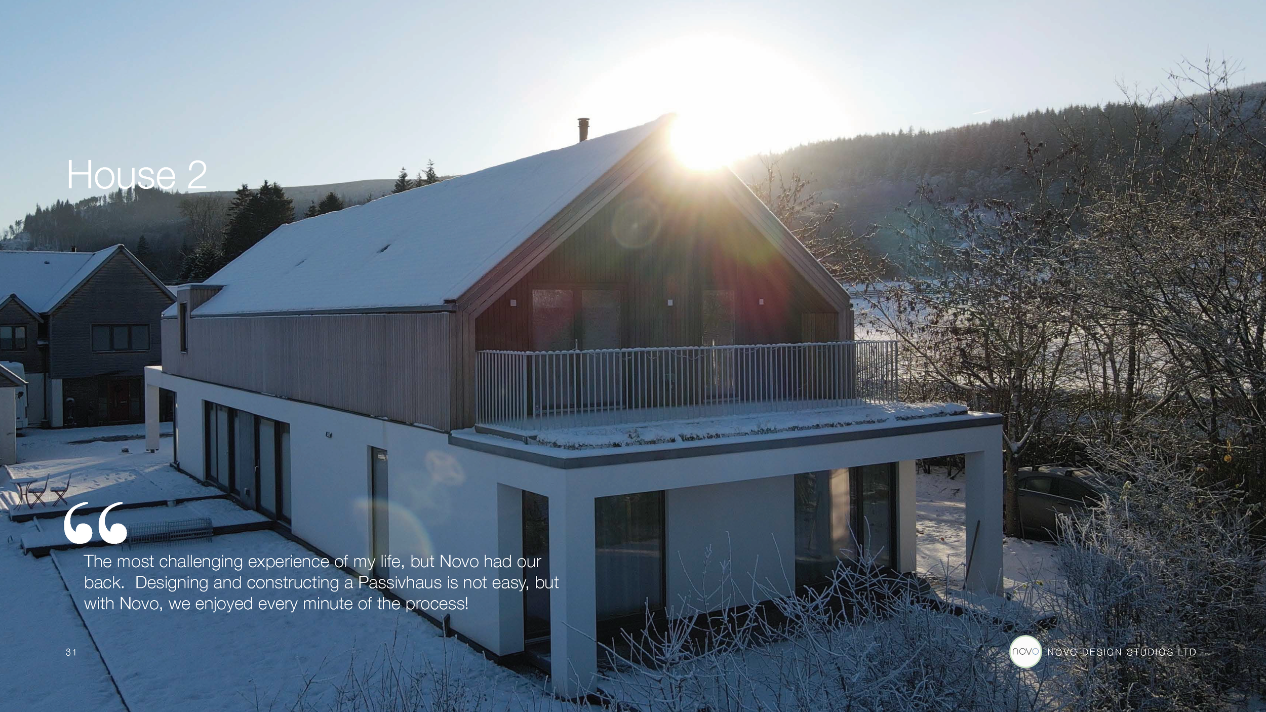 Novo-designed Passivhaus home in the Scottish Borders, snow-covered roof lit by winter sun