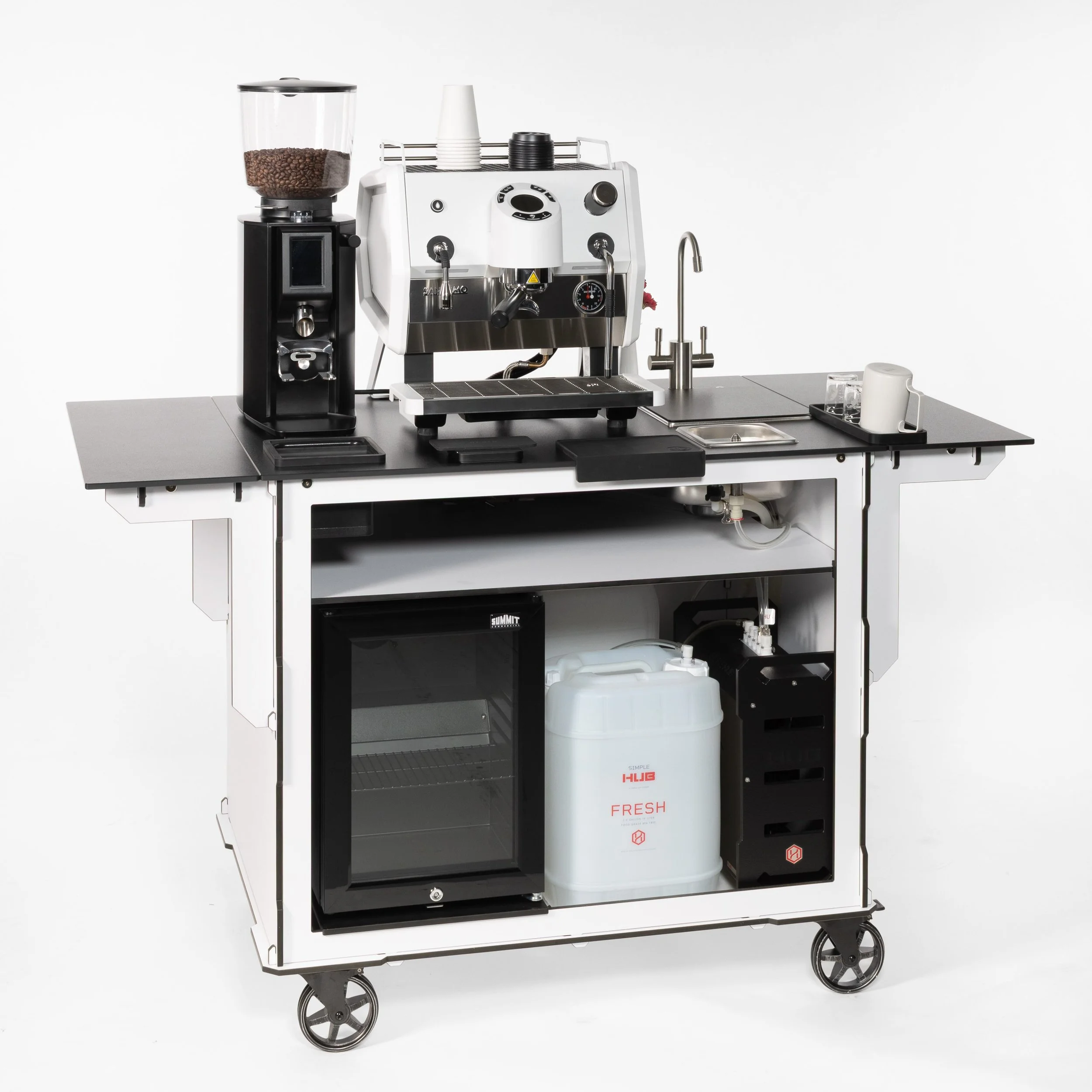 Pulls above its price class. Sanremo D8 ONE.

&bull; $6,300
&bull; 120V 
&bull; 4L Heat Exchange Boiler
&bull; Programmable Brew Temperature 
&bull; Programmable Volumetric Doses
&bull; Compact Footprint
&bull; Weighs roughly the same as similarly pr
