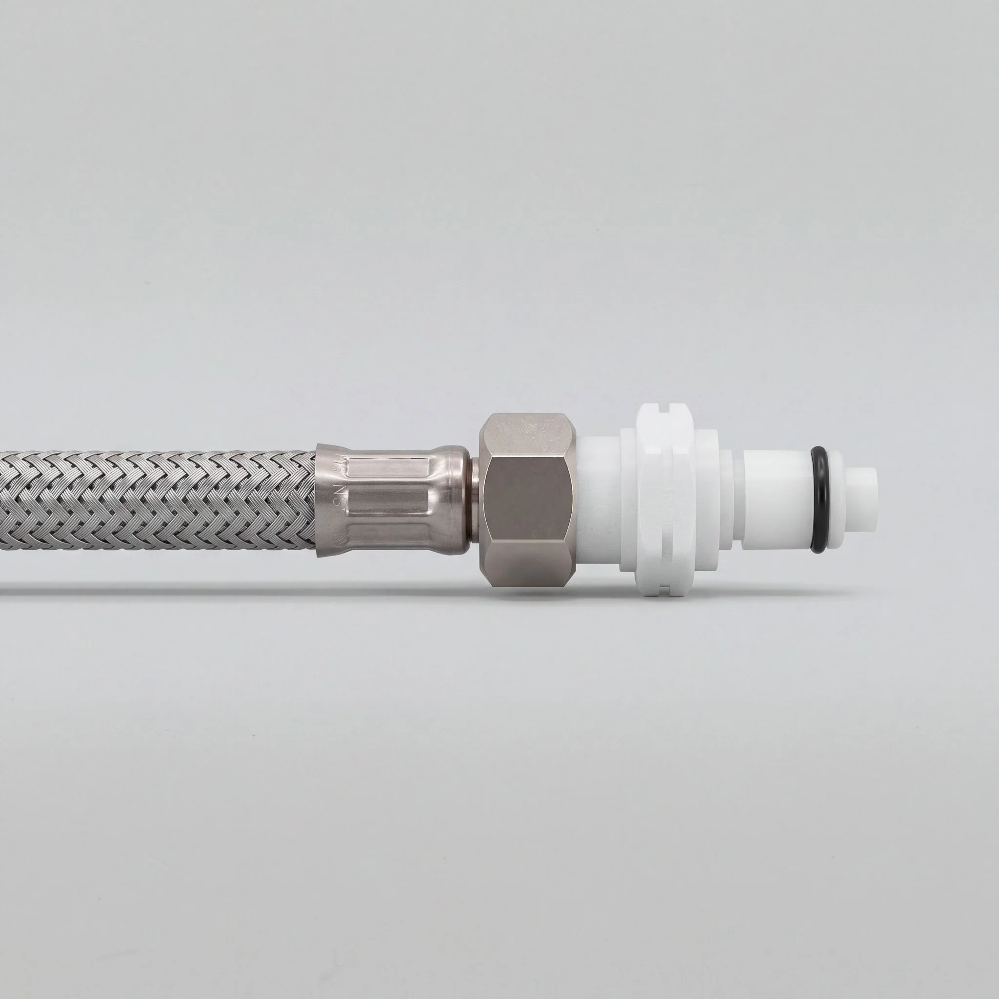 Hub Compression Coupling Attached to Stainless Braided Line.jpg