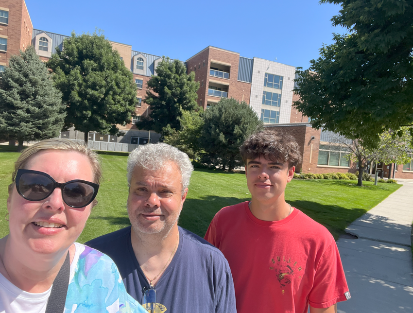 Parents dropping off son at college dorm