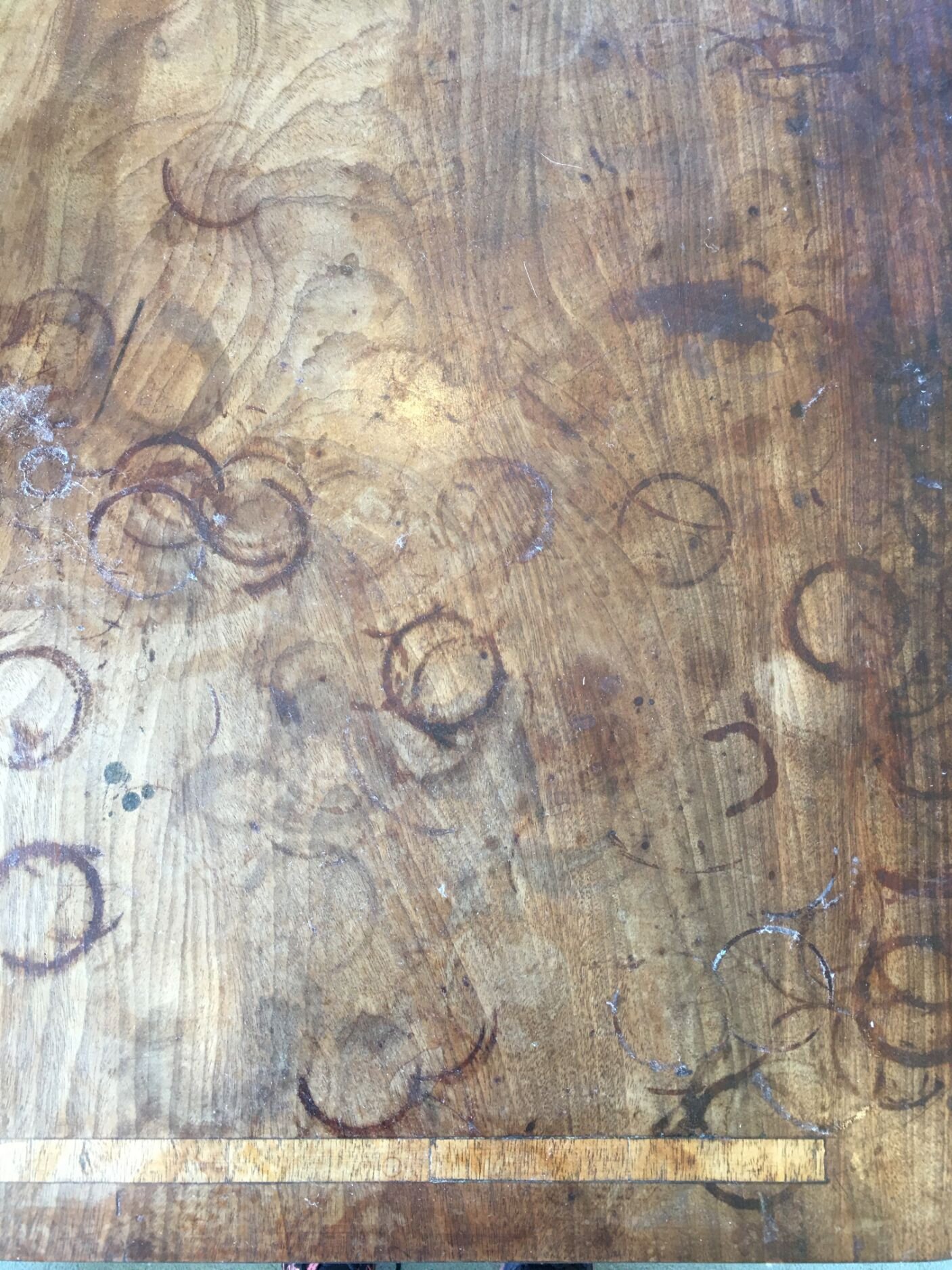 8b detail of damage on dressing table top in Bishops Waltham, Hampshire.jpg