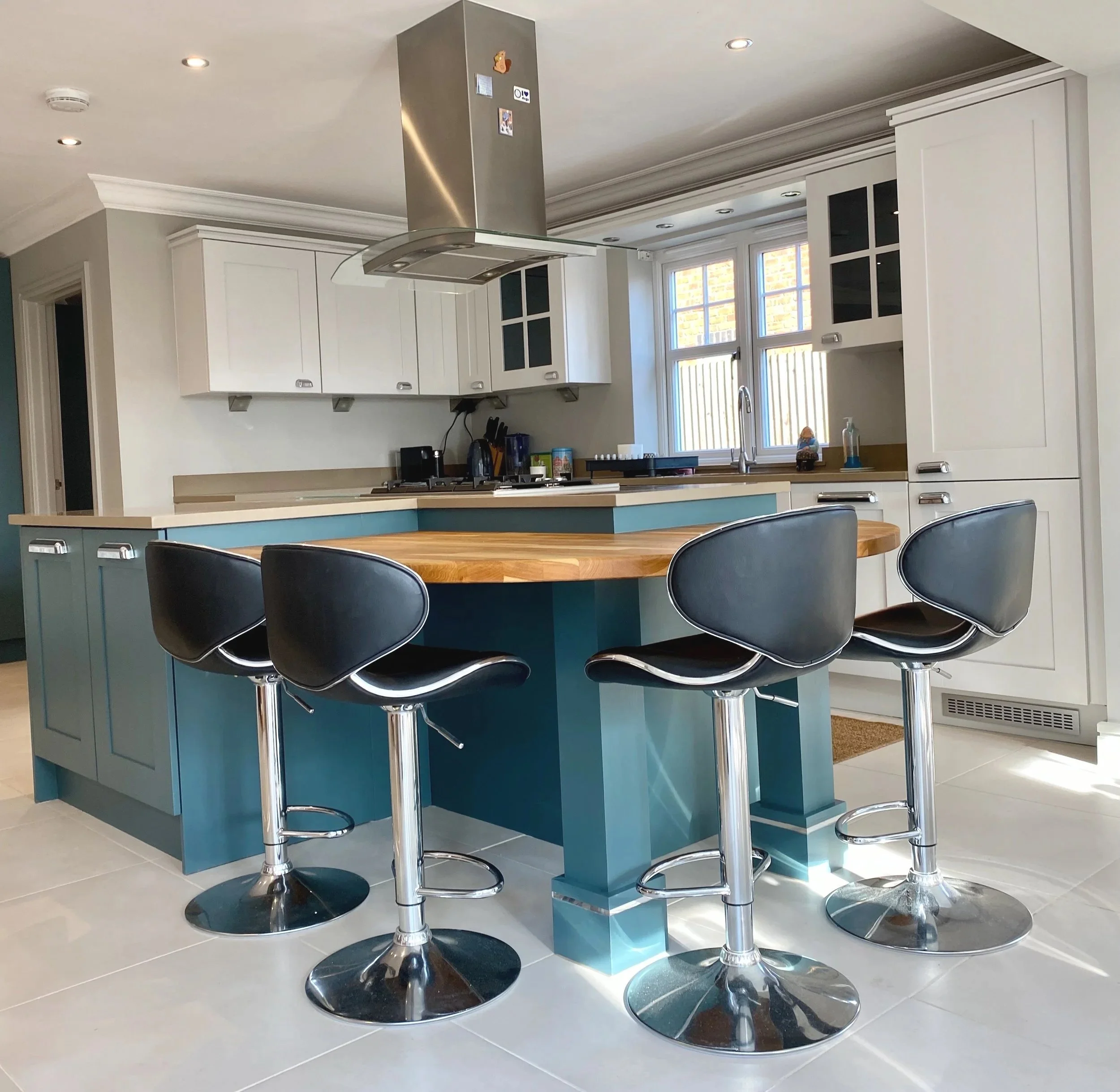 Refurbished kitchen painted in Farrow & Ball 'Inchrya Blue' and 'Ammonite' equivalent in Tikkurila Helmi 10 in Camberley, Surrey. The island also had a sand and re oil with Osmo top oil