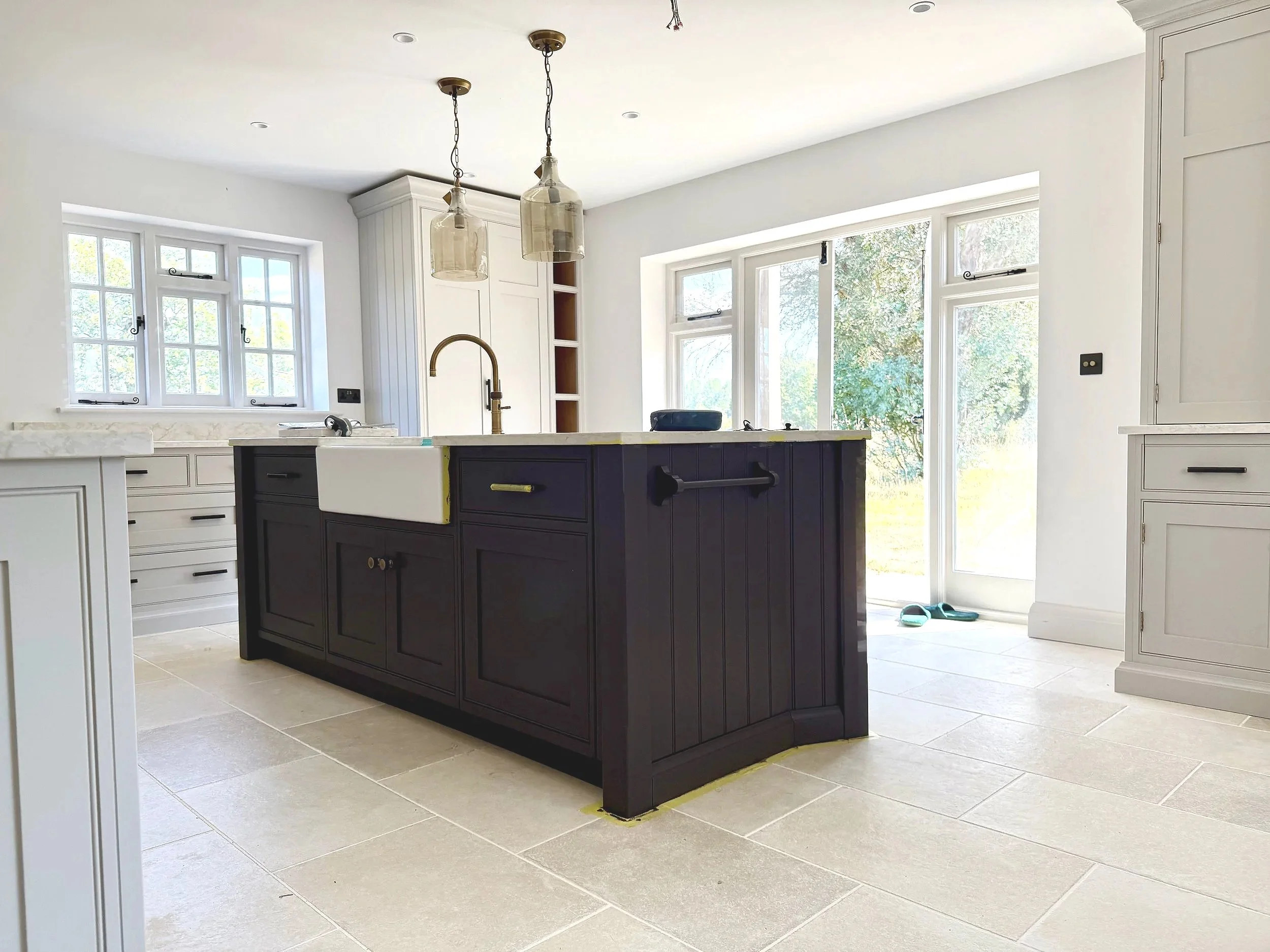 A stunning kitchen by Cutler & Berry hand painted in Benjamin Moore Scuffex