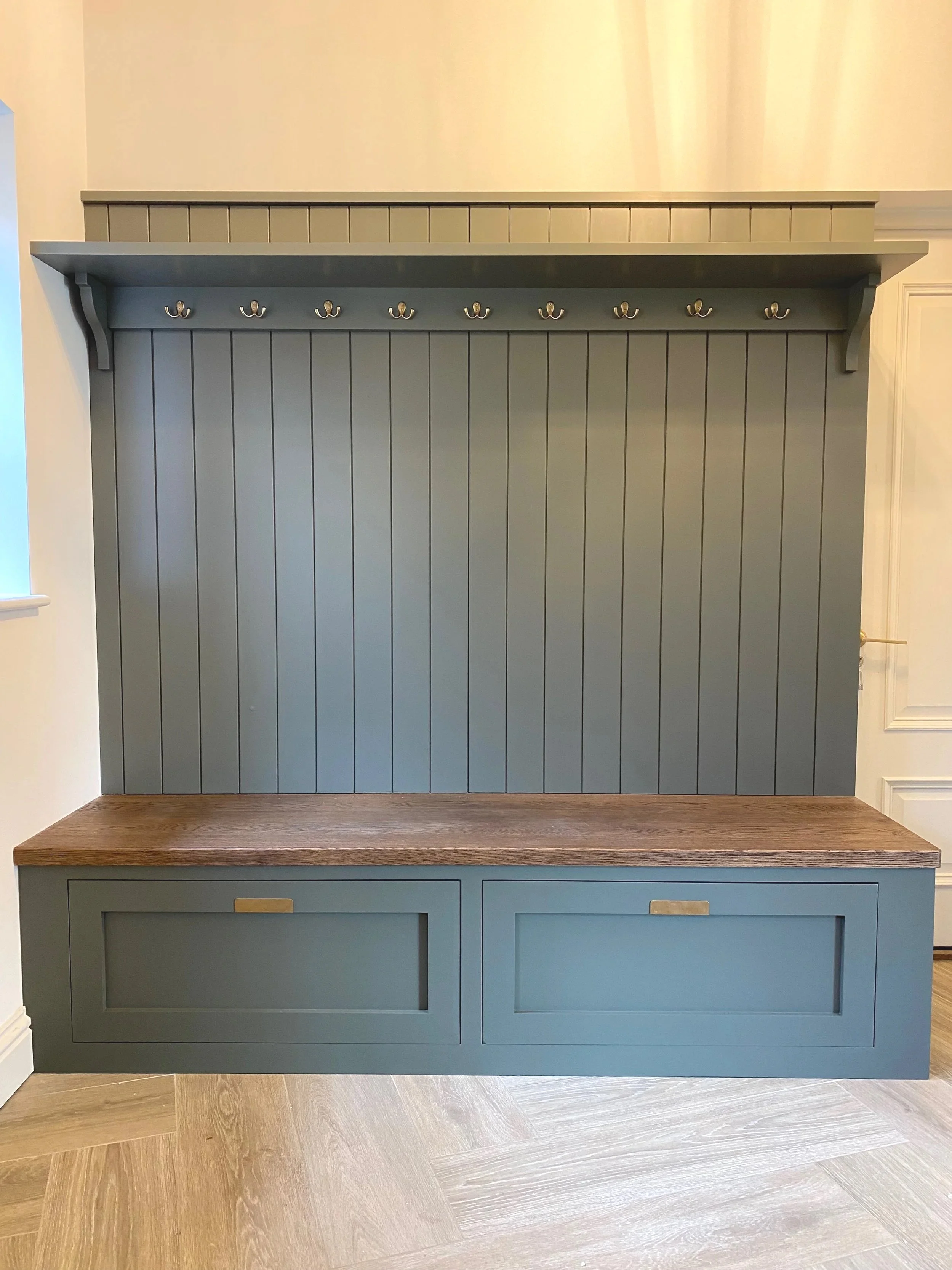 A lovely boot room by Higham Furniture, hand painted by Larsen Paint Finishes in Little Greene 'Pompeian Ash'