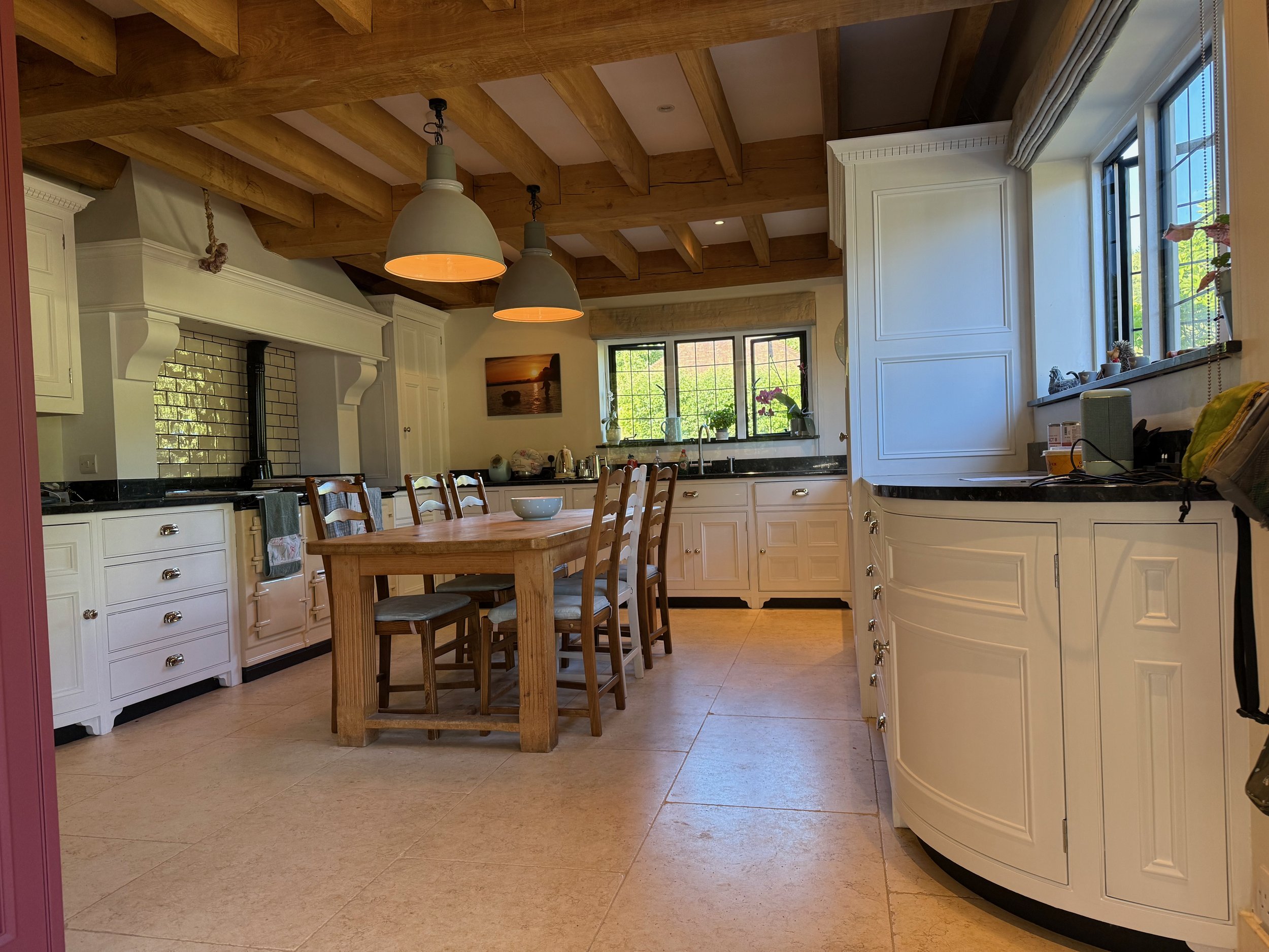 A refurbished kitchen in West Sussex hand painted in Intact 8 'Wimborne White' and new handles supplied by The Handle Studio