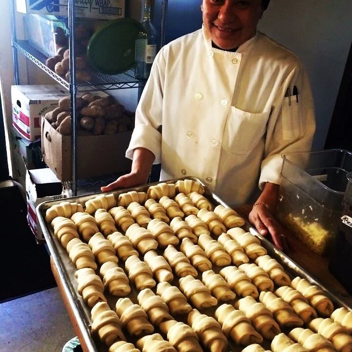 a sheet of croissants ready for the oven