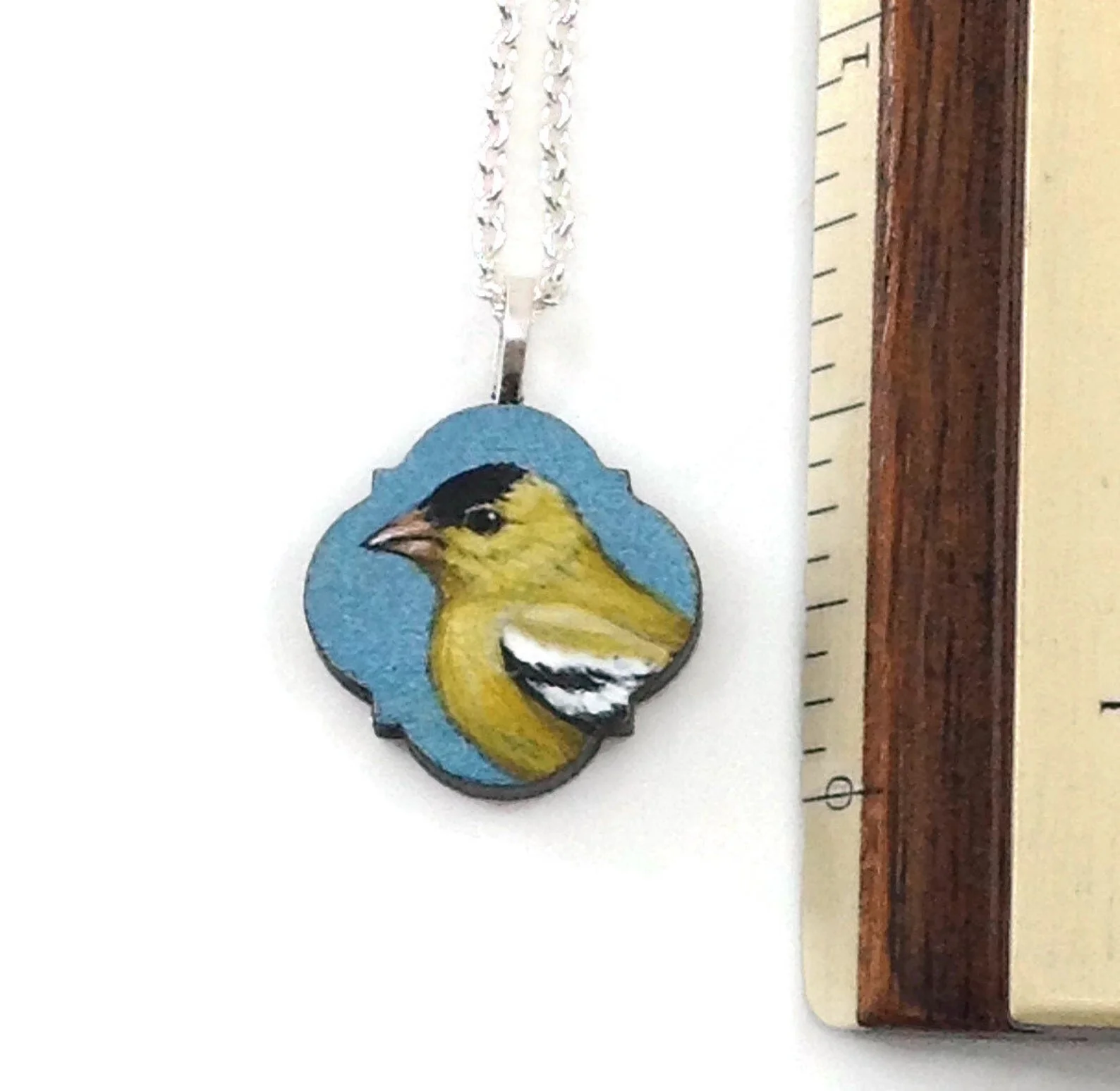 Painting two little goldfinches...