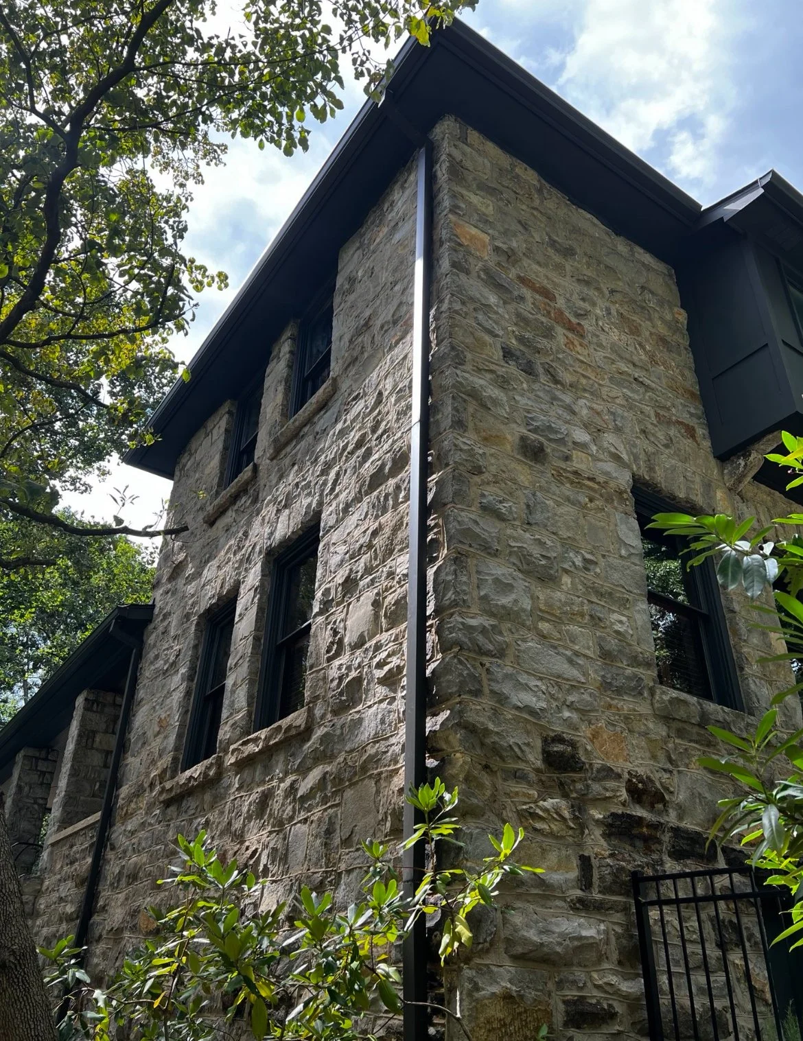 Seamless gutter and square downspout installation on a home in the Murdock-Linden neighborhood of Asheville, NC
