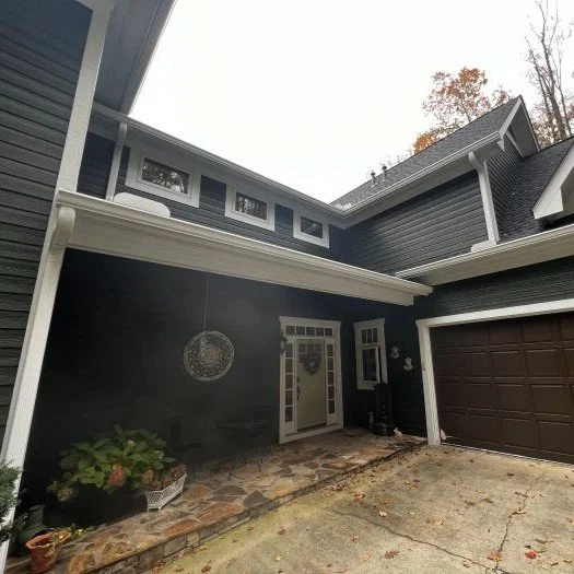 Completed seamless gutter system installed on a home (special order color: Frost) in Asheville, NC