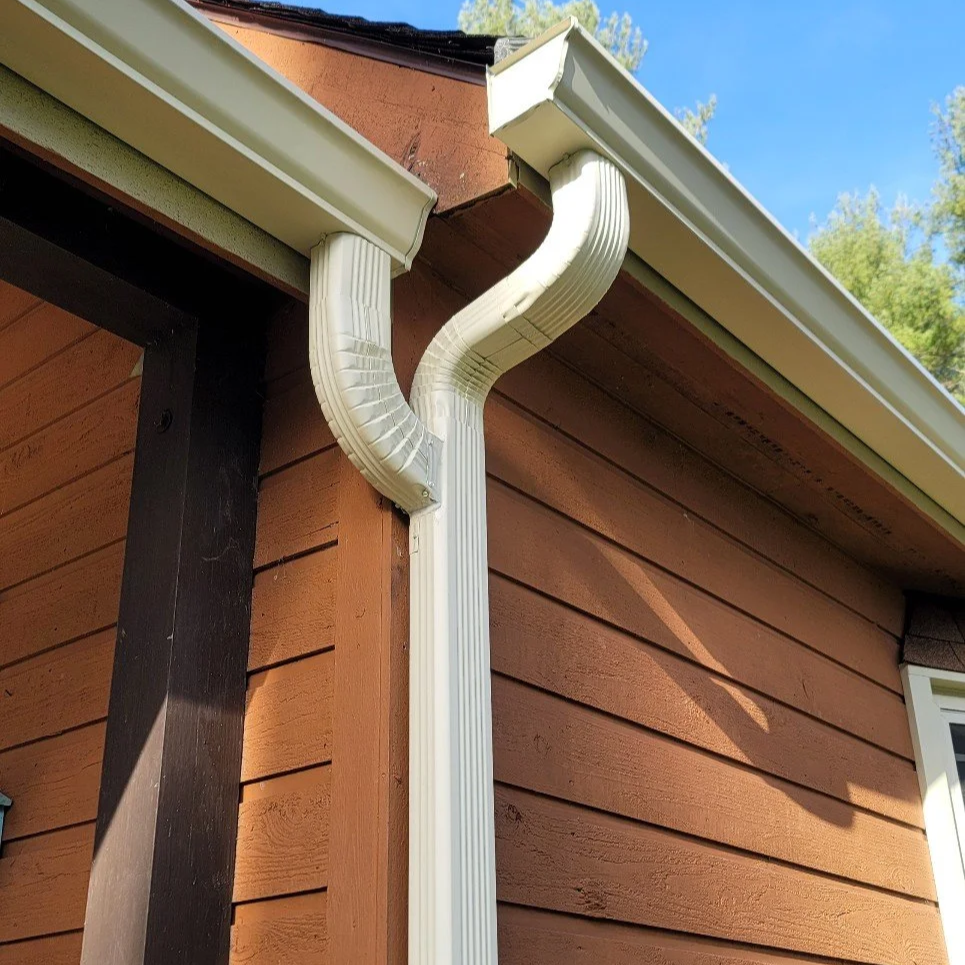 New  3x4 "cactus" downspout installed by gutter installers in Candler, NC