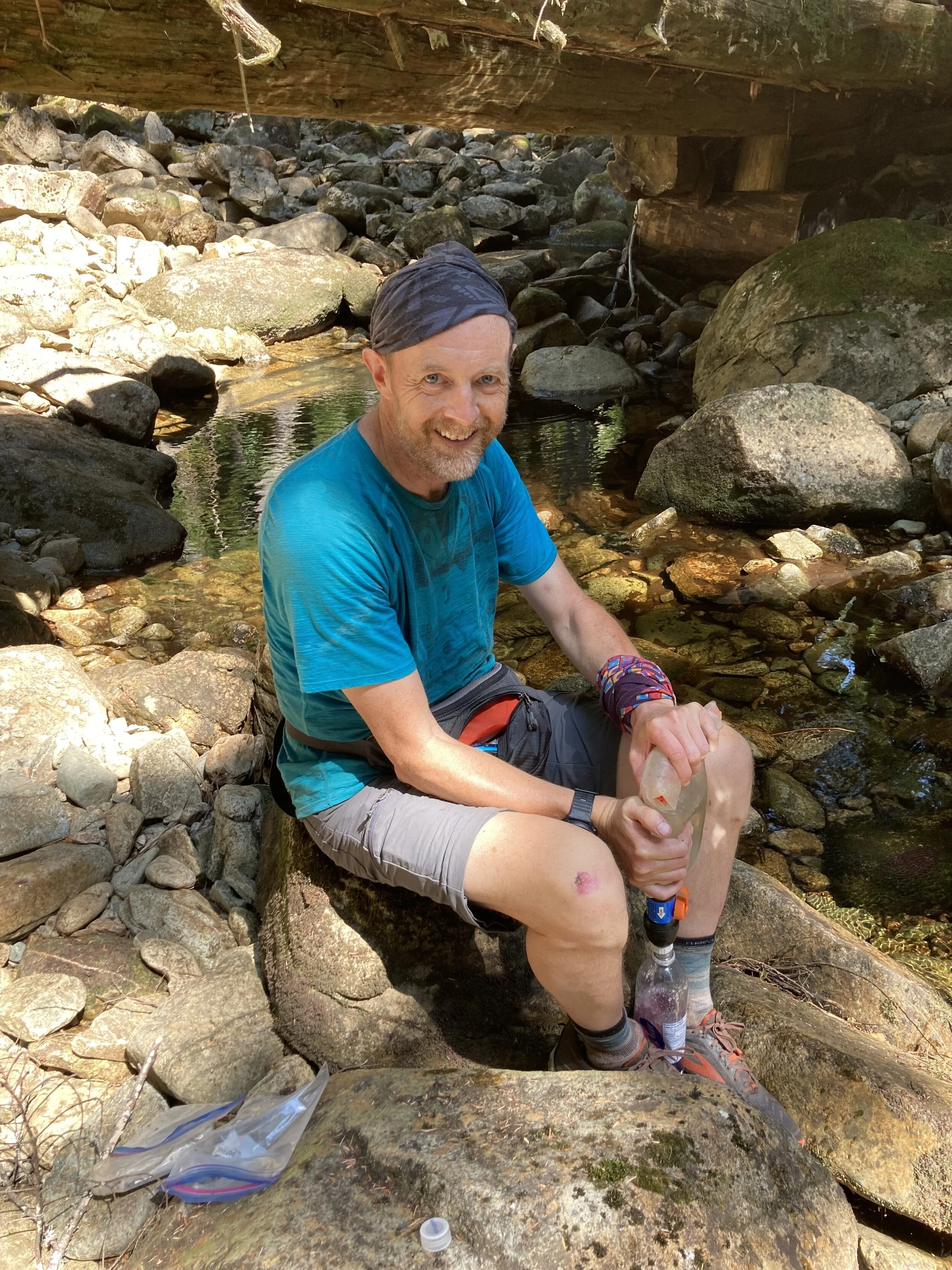 David filtering water at Appleton Creek