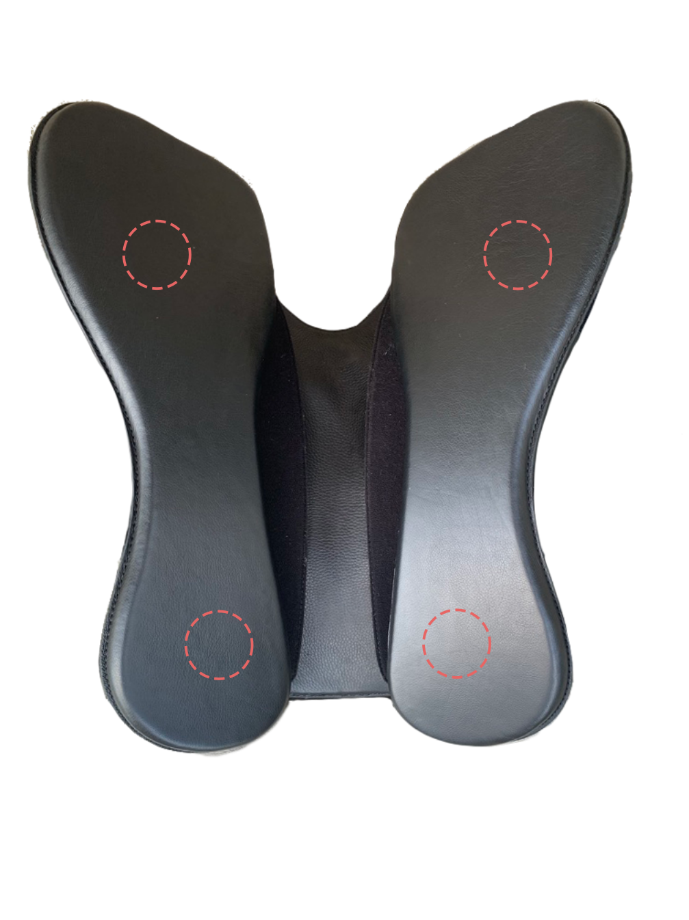 Massage chair with four circular spots marked on the sides and backrest.
