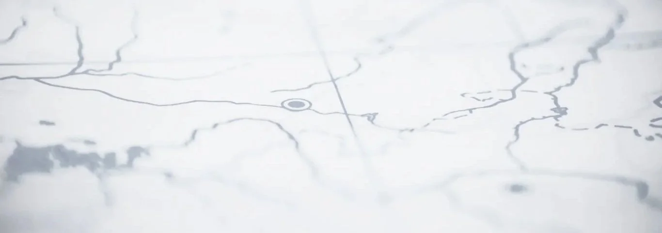 Close-up of a printed map with various lines and marks.