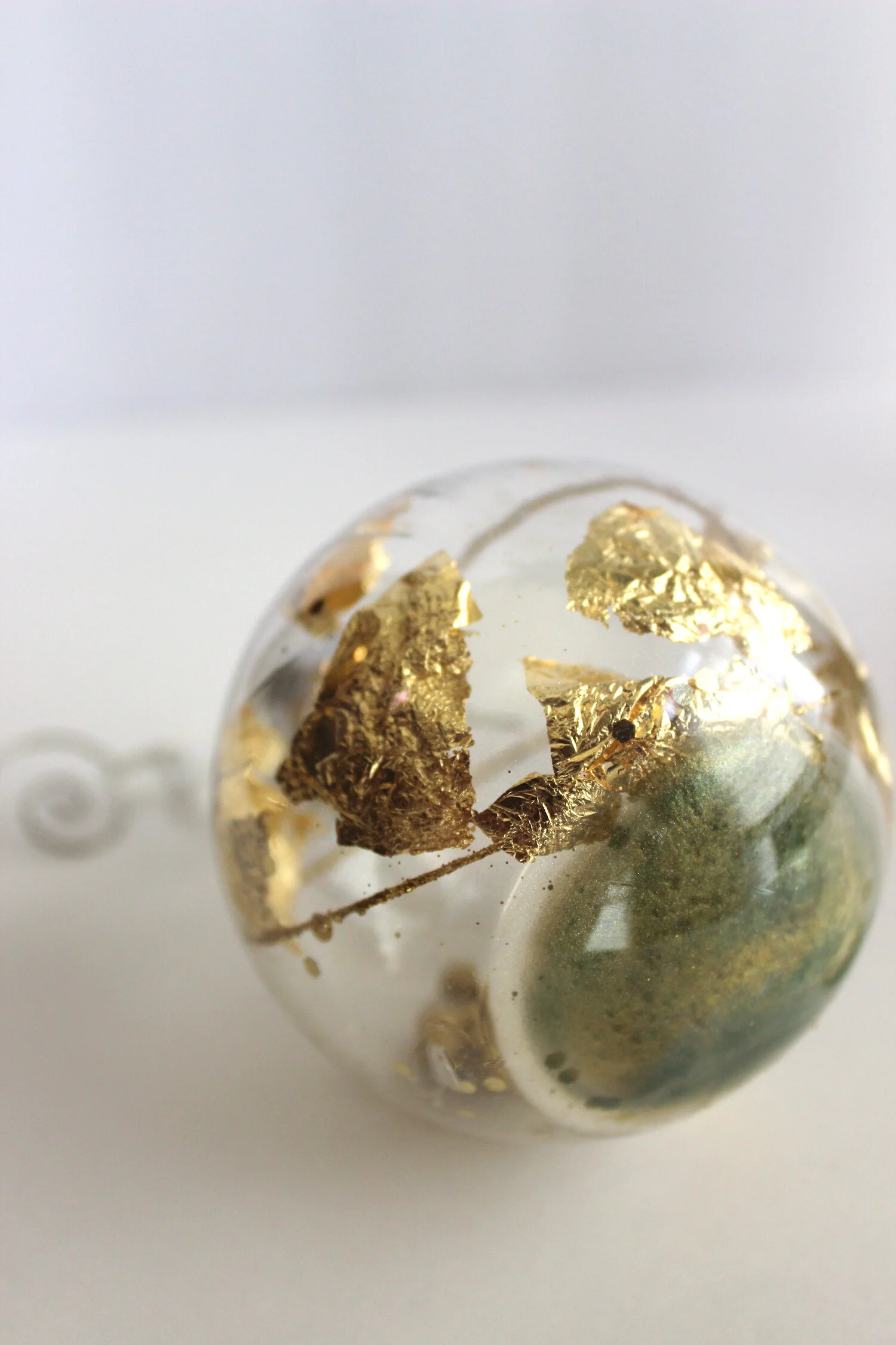 Ornaments: green metallic sphere