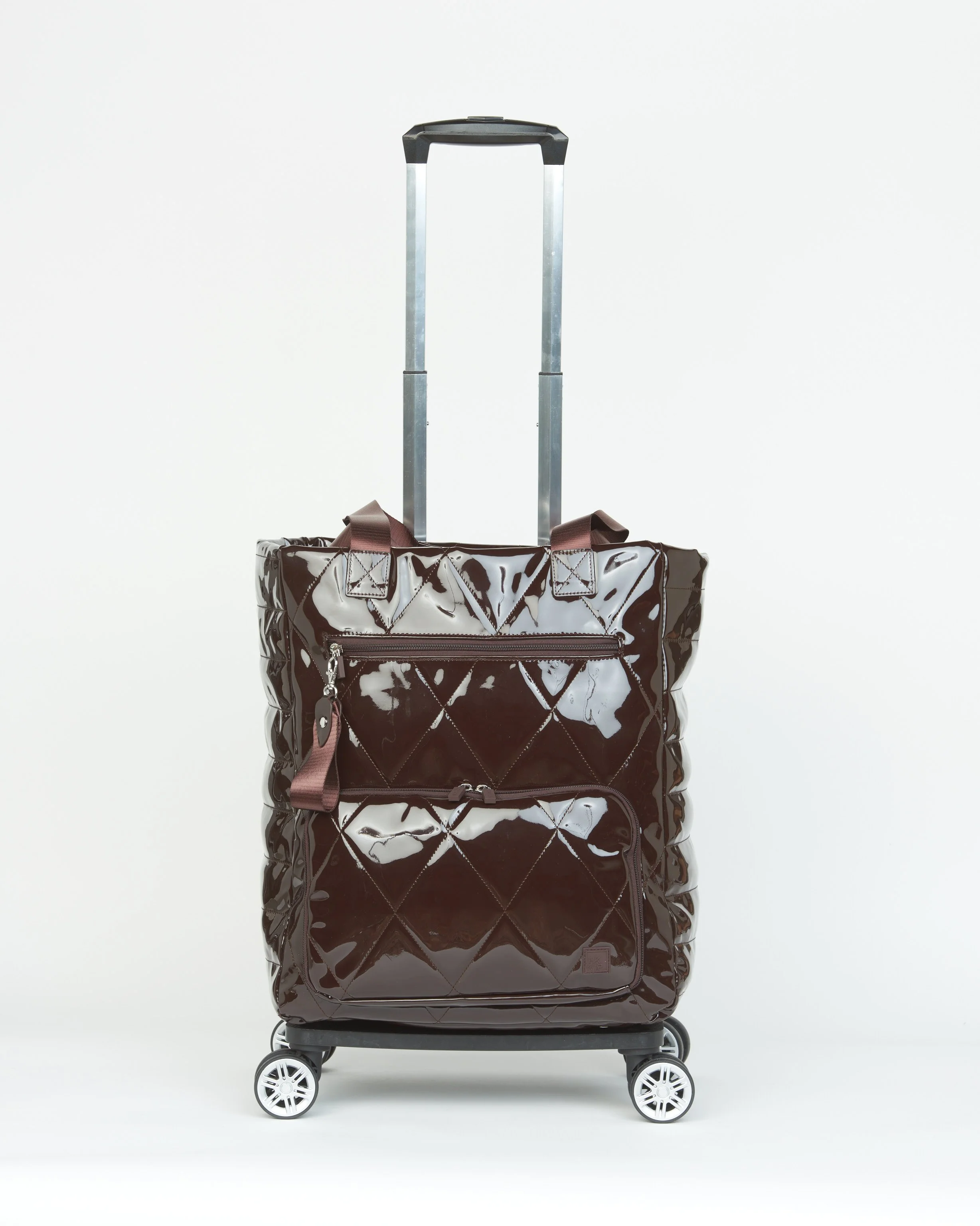 THE ON-A-ROLL CONVERTIBLE ROLLER TOTE - PATENT TRUFFLE