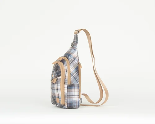 THE CONVERTIBLE SIDEKICK SLING BACKPACK POSITIVELY PLAID — IHKWIP