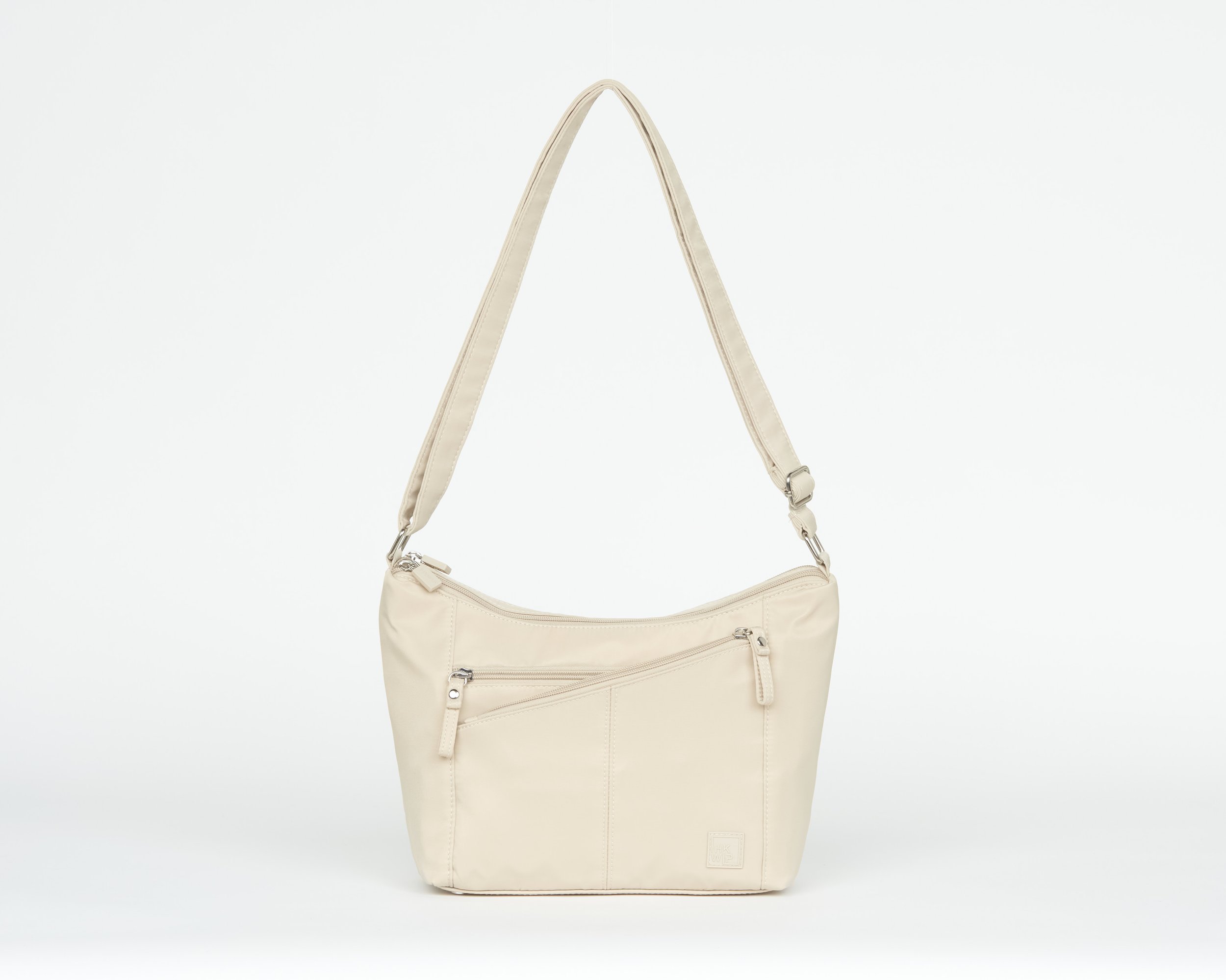 THE CRISS CROSS CONVERTIBLE CROSSBODY BAG - SAND