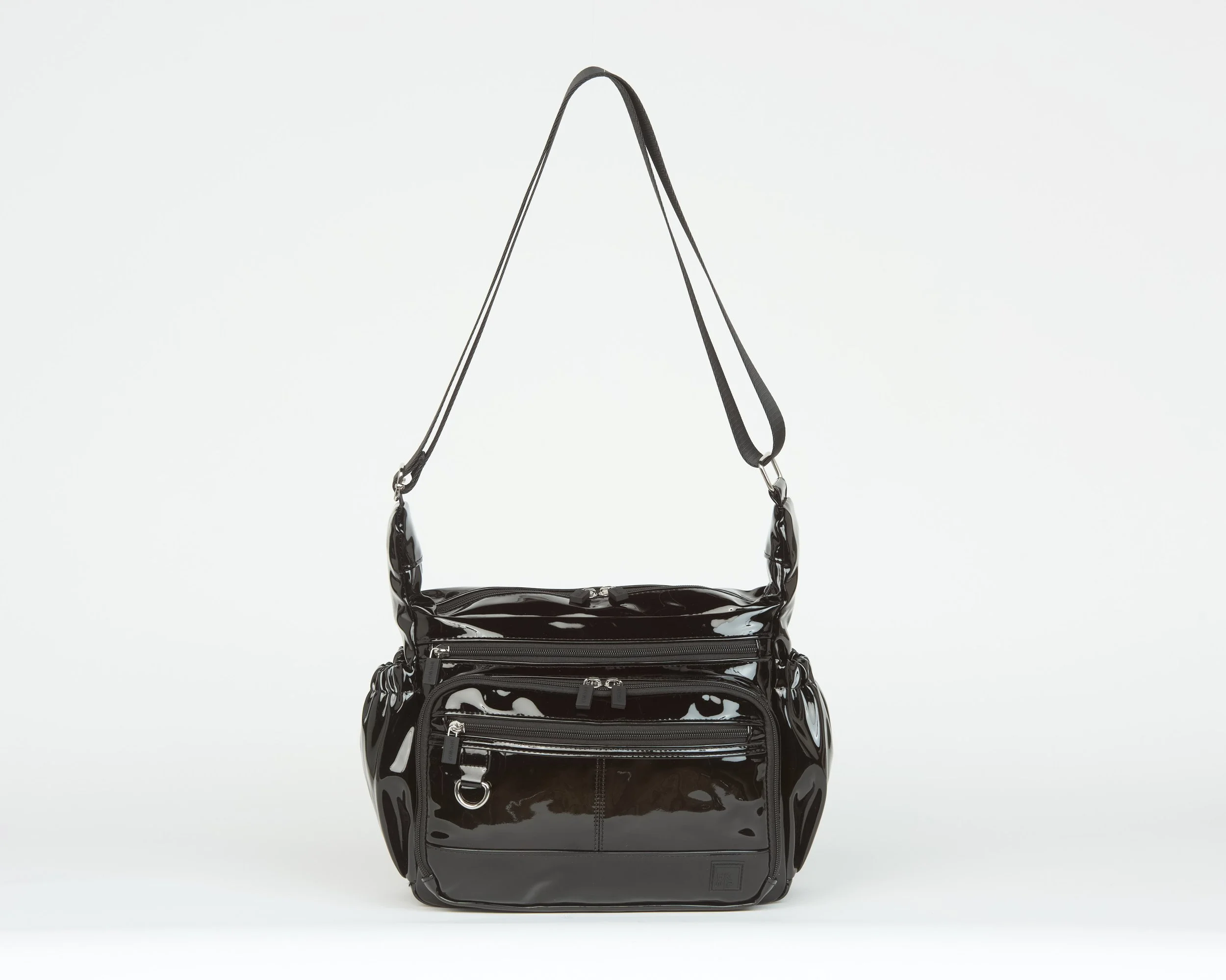 THE EVERYDAY EXPLORER MESSENGER CROSSBODY - PATENT BLACK