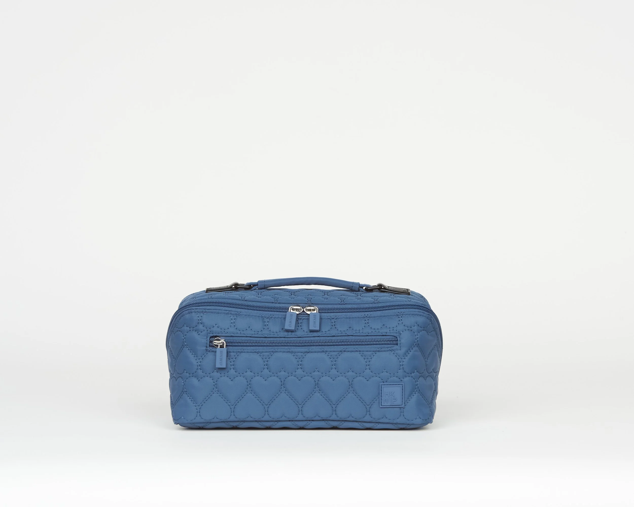 THE CARRY IT ALL HEART QUILTED COSMETIC CASE - VINTAGE NAVY