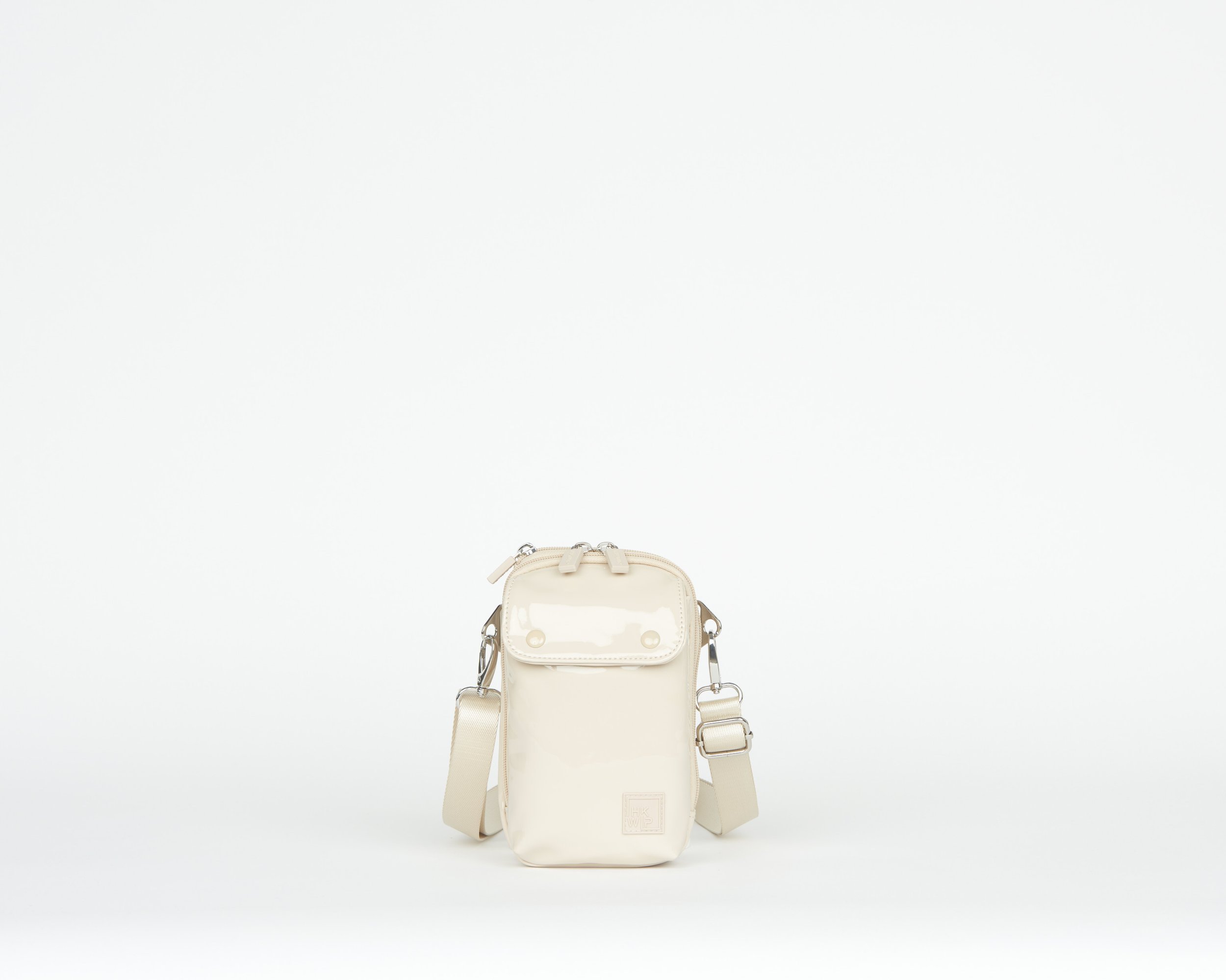 THE PATENT EVERYDAY ESSENTIALS CROSSBODY - SAND