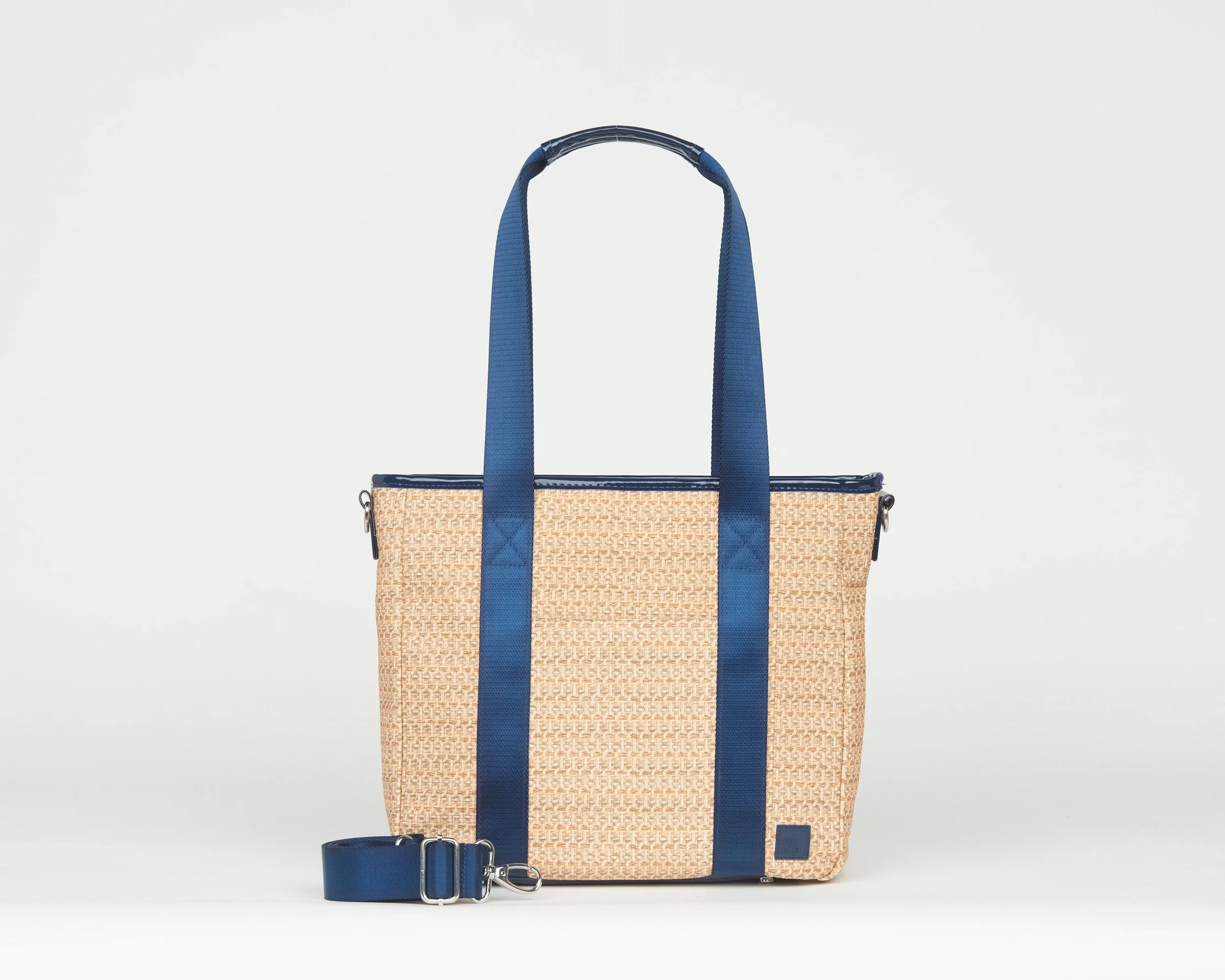 THE RAFFIA CARRY YOUR CONFIDENCE TOTE W/ CROSSBODY STRAP - PATENT NAVY