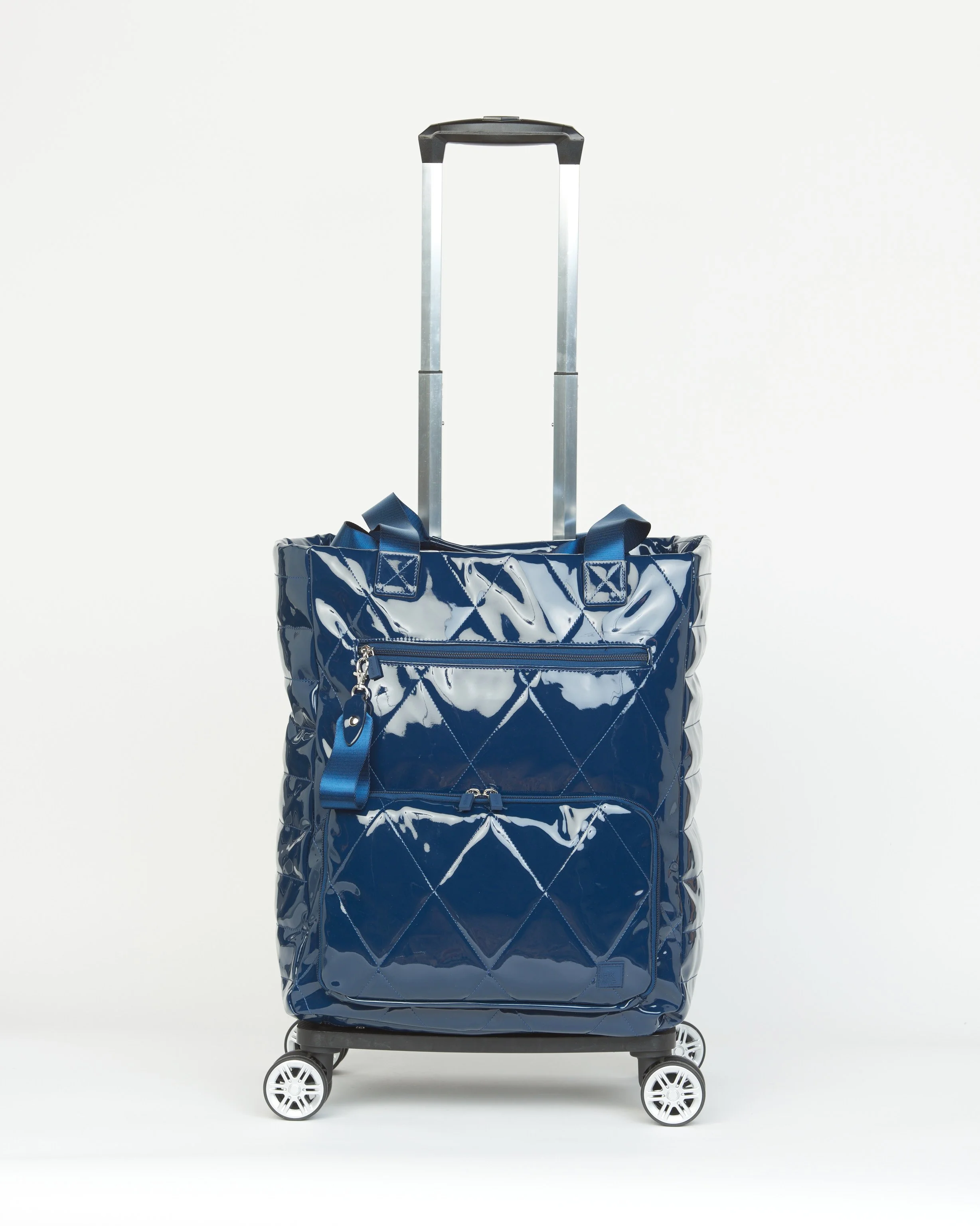 THE ON-A-ROLL CONVERTIBLE ROLLER TOTE - PATENT NAVY