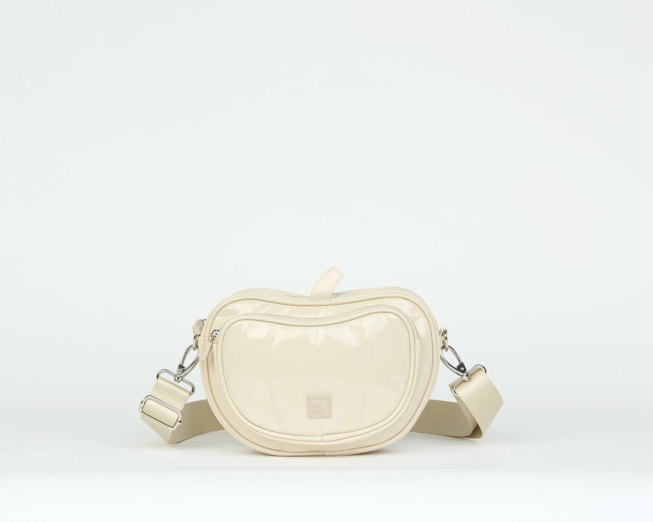 THE PERMISSION TO PUMPKIN CROSSBODY - PATENT SAND