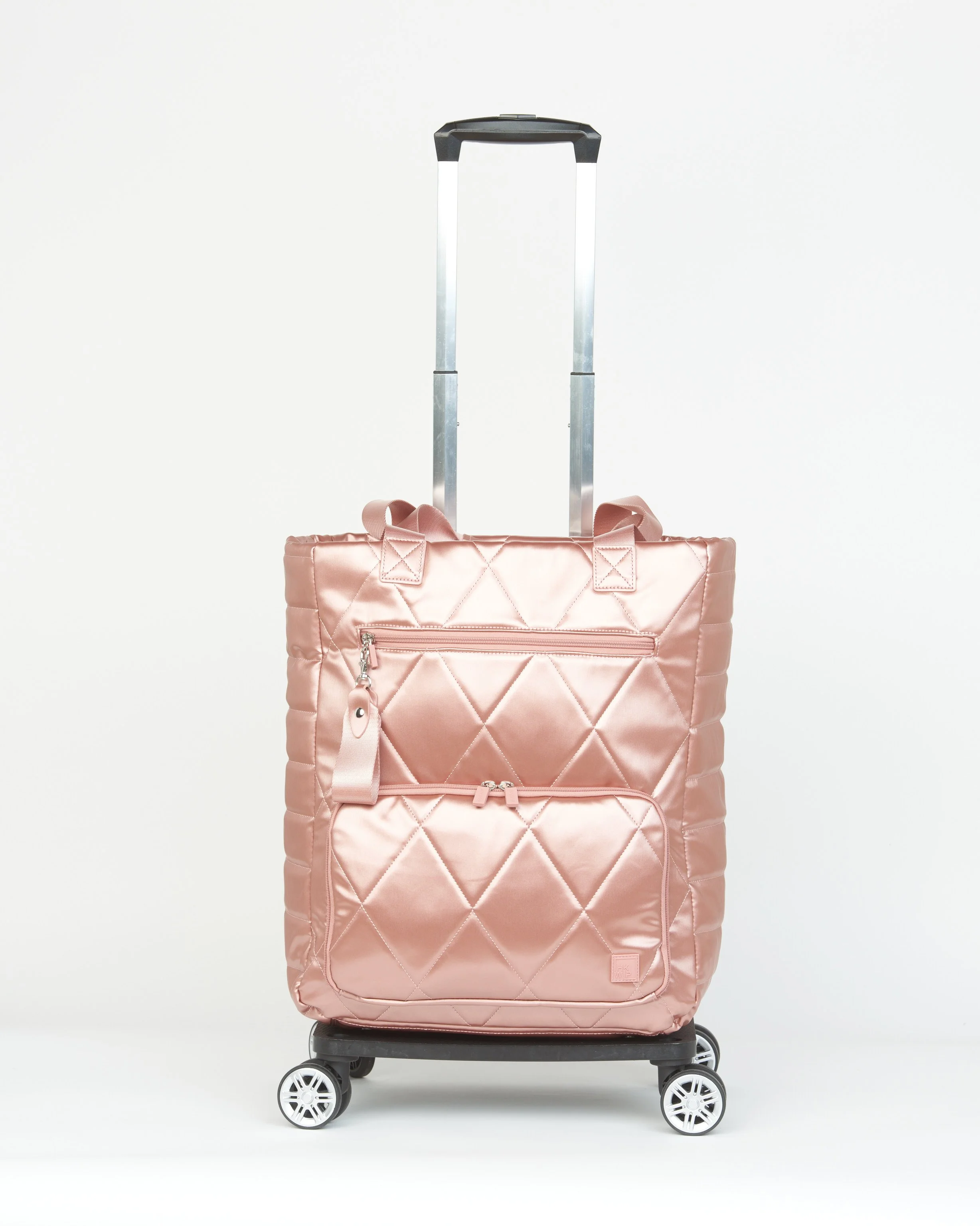 THE ON-A-ROLL CONVERTIBLE ROLLER TOTE - METALLIC ROSE GOLD