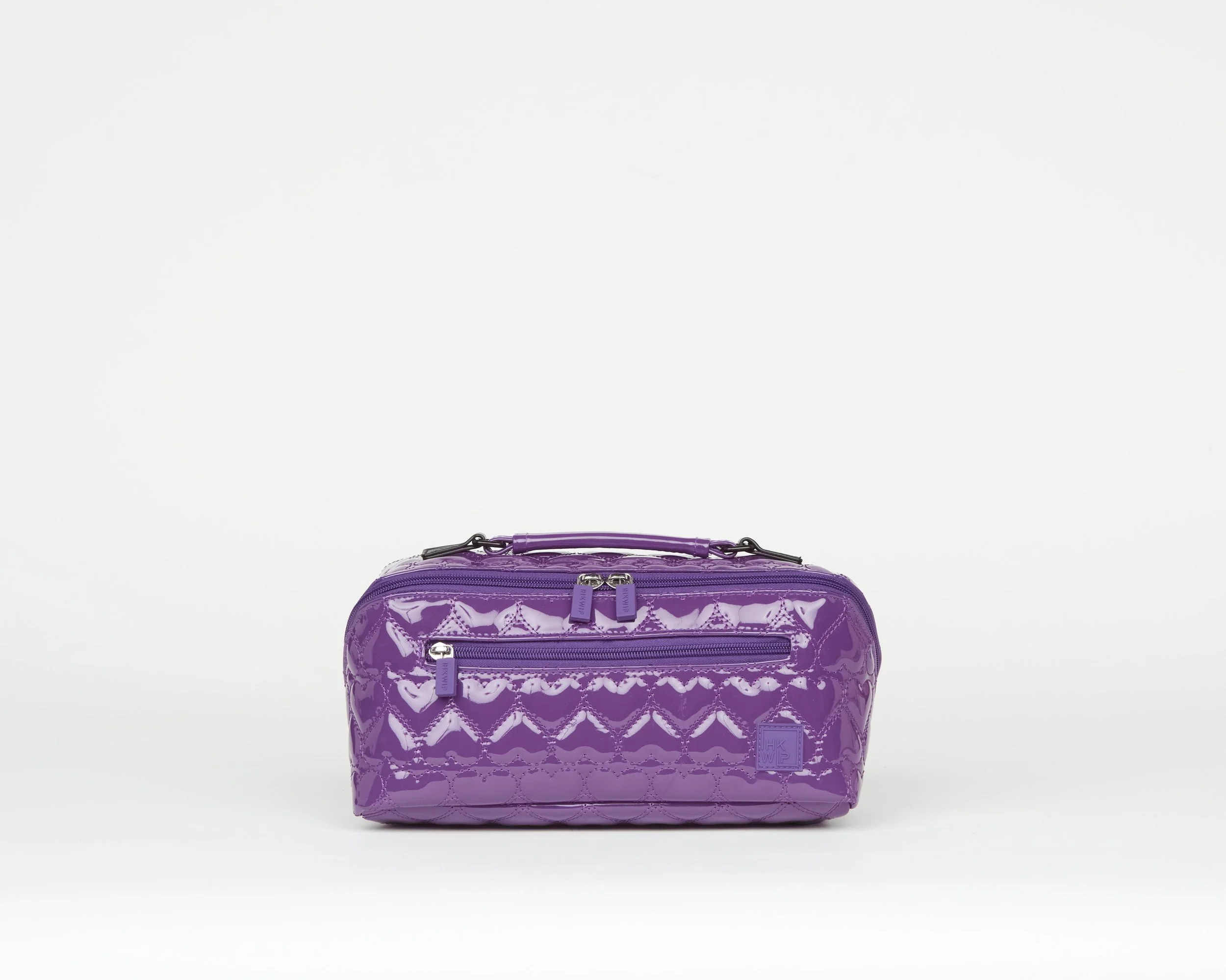 THE CARRY IT ALL HEART QUILTED COSMETIC CASE - PATENT PURPLE